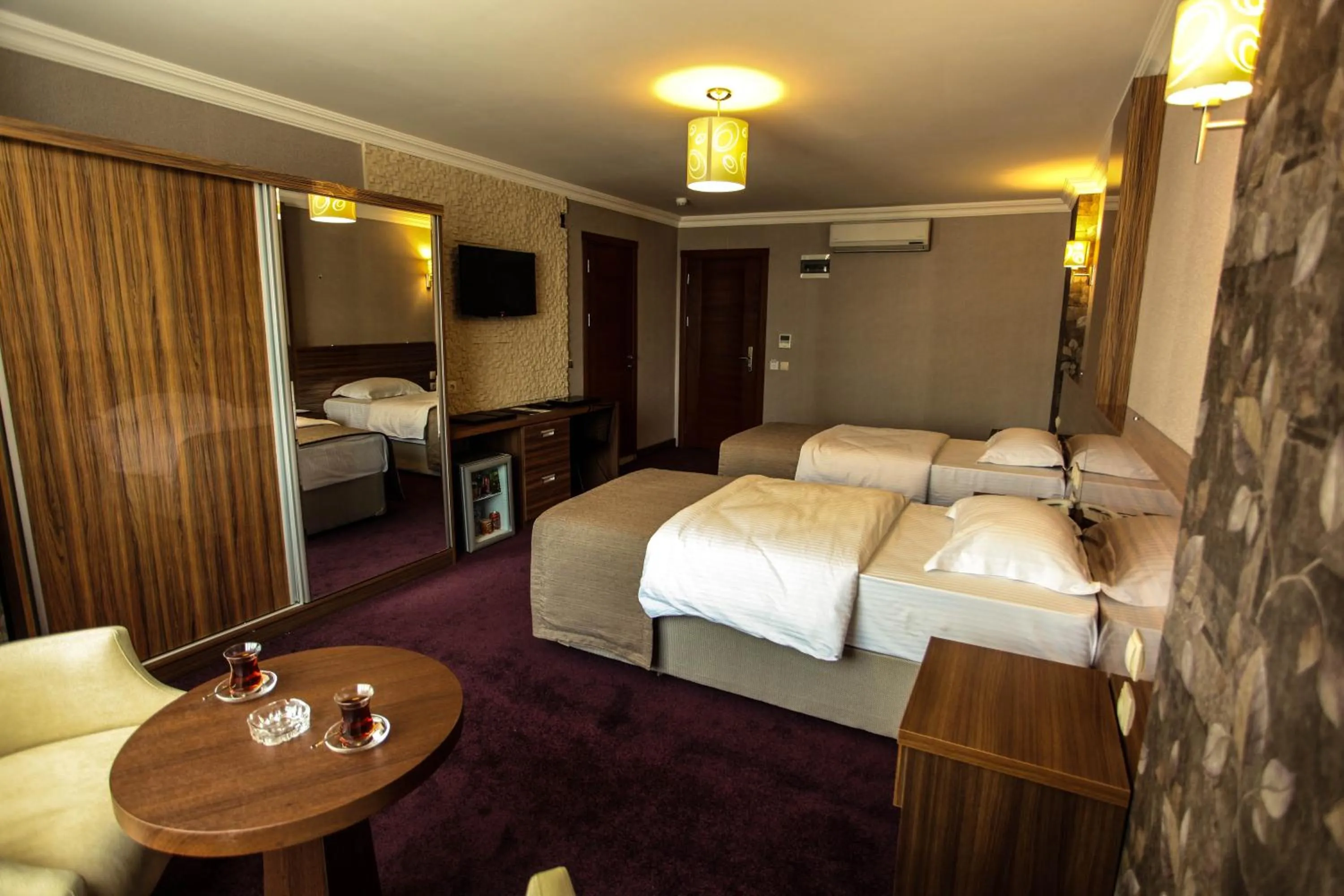 Photo of the whole room, Bed in Grand Akçalı Otel