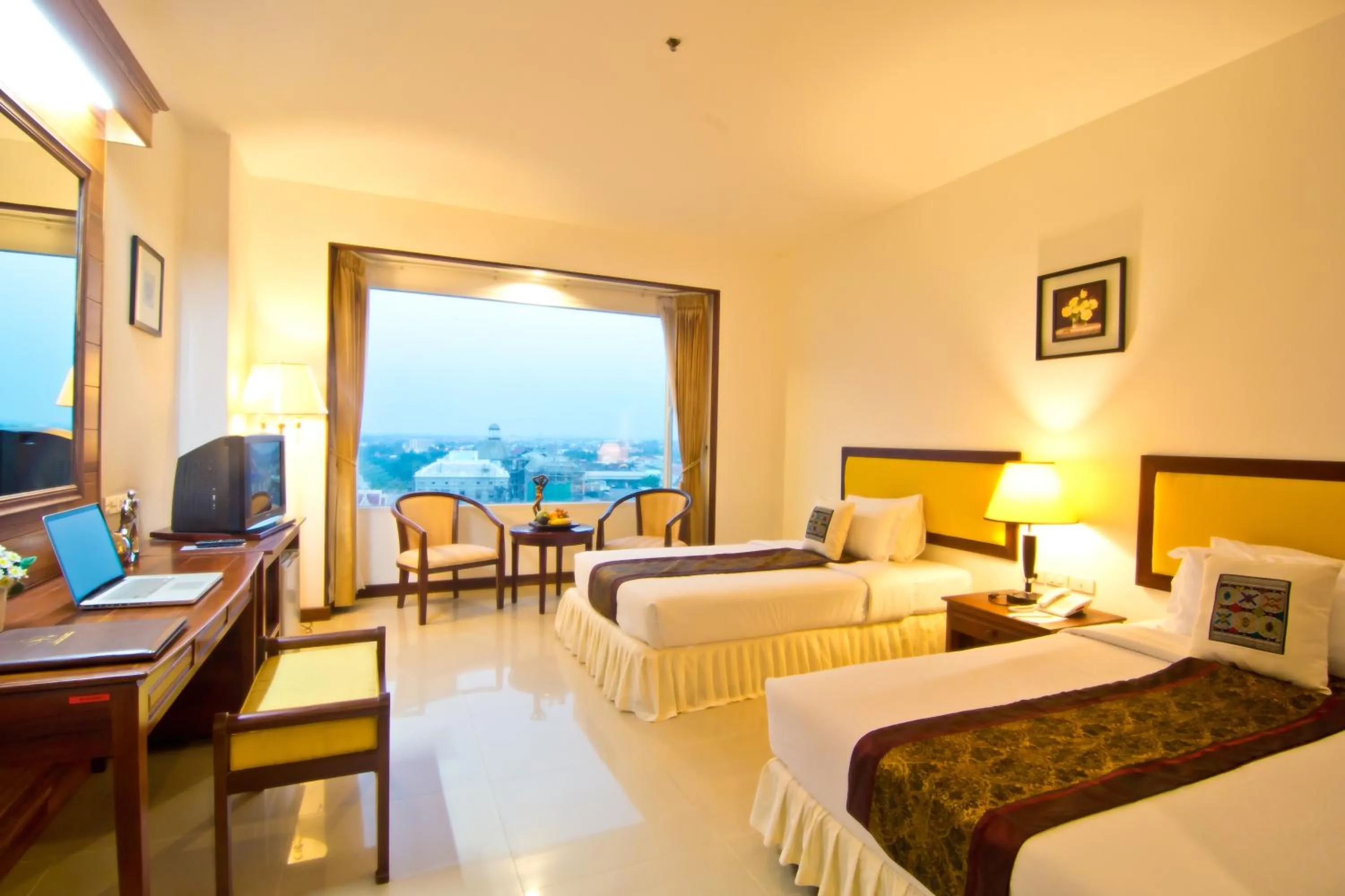 Bed in Champasak Grand Hotel