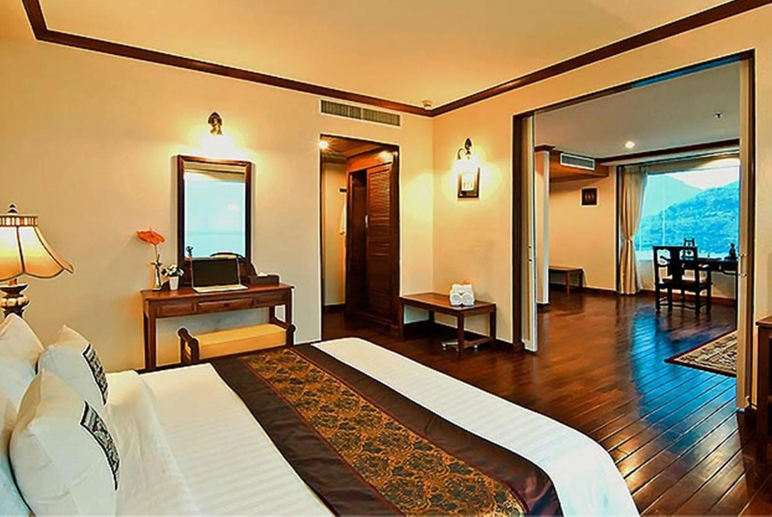 Bed in Champasak Grand Hotel