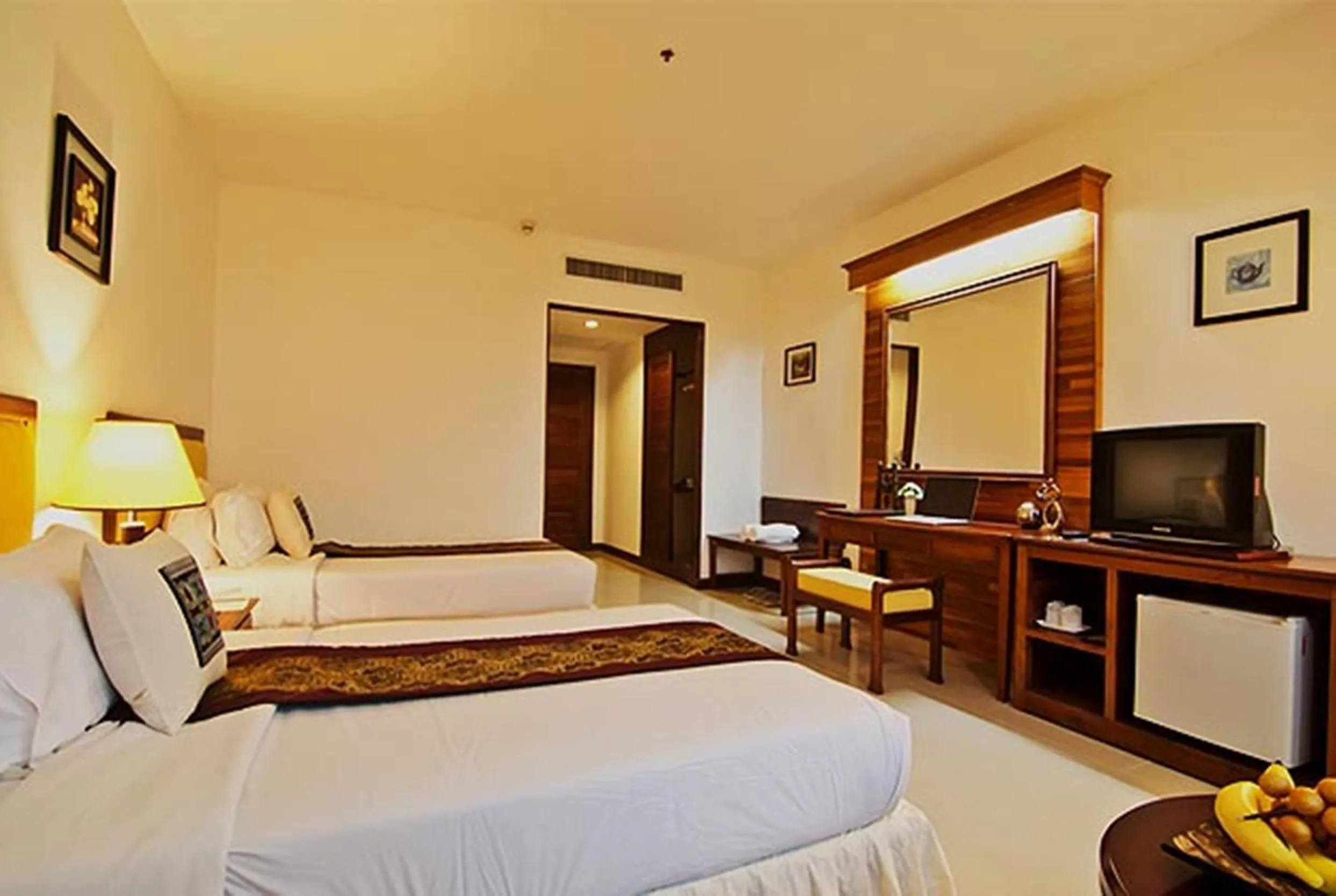 Bed in Champasak Grand Hotel
