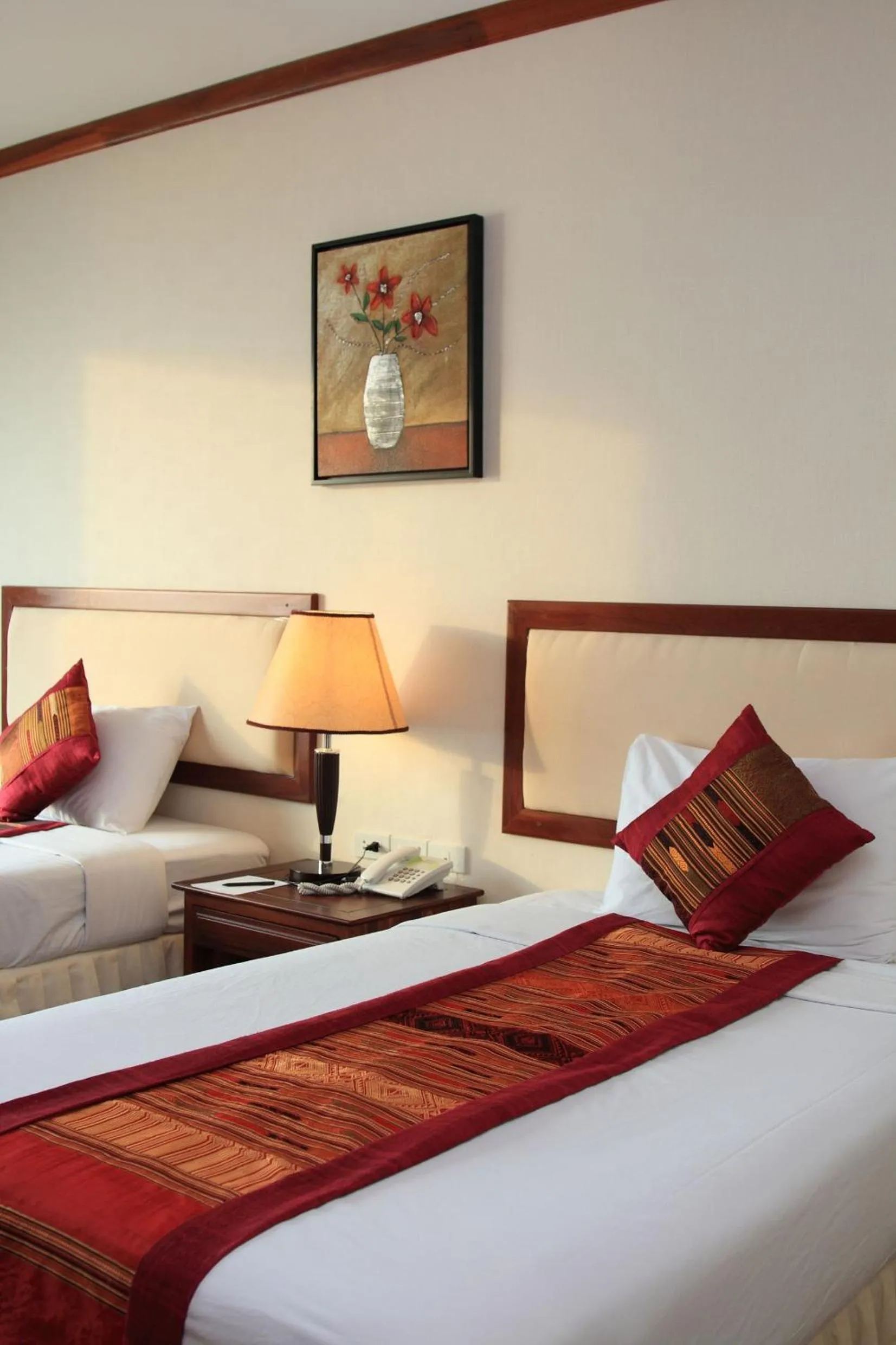 Bed in Champasak Grand Hotel