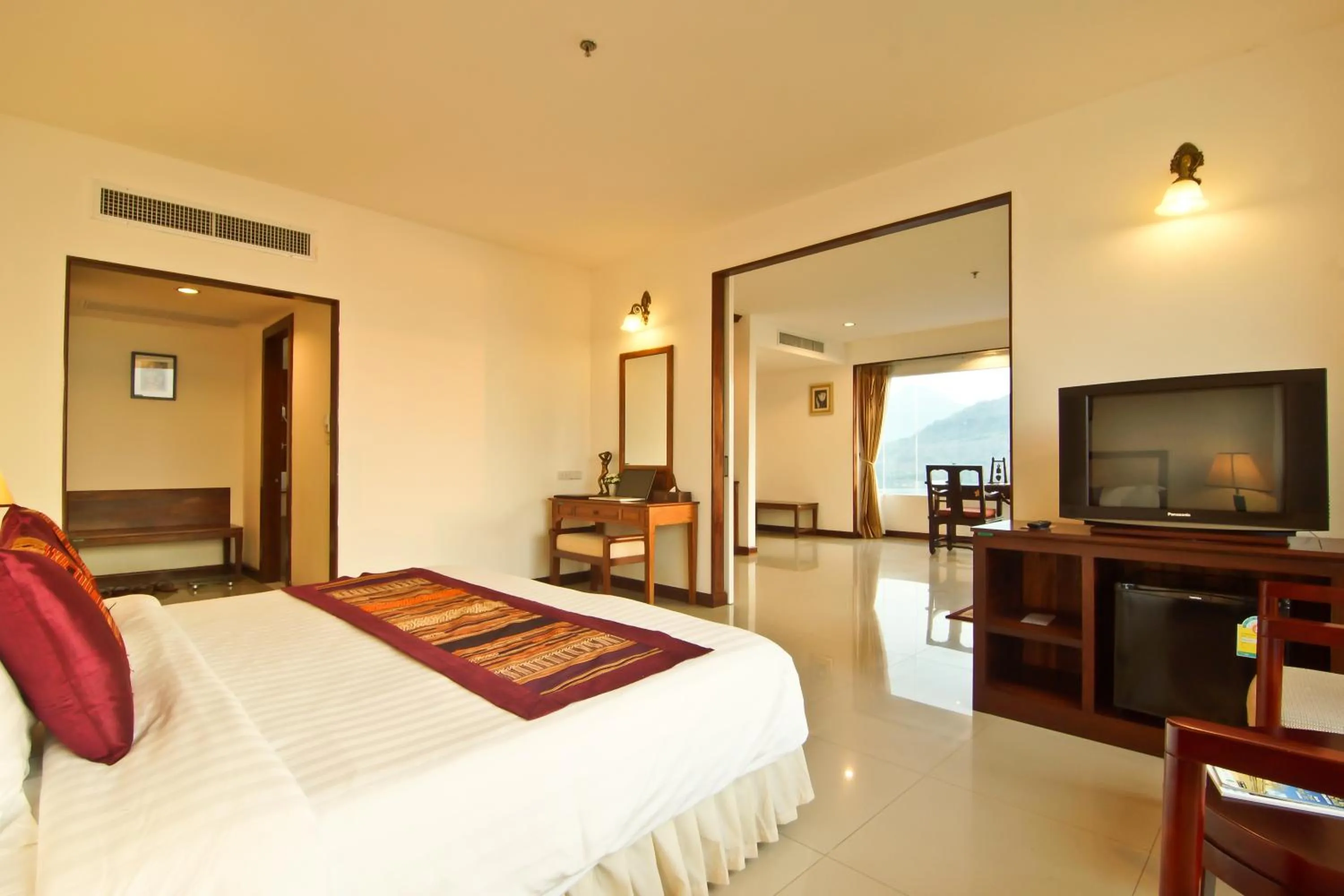 Bed in Champasak Grand Hotel