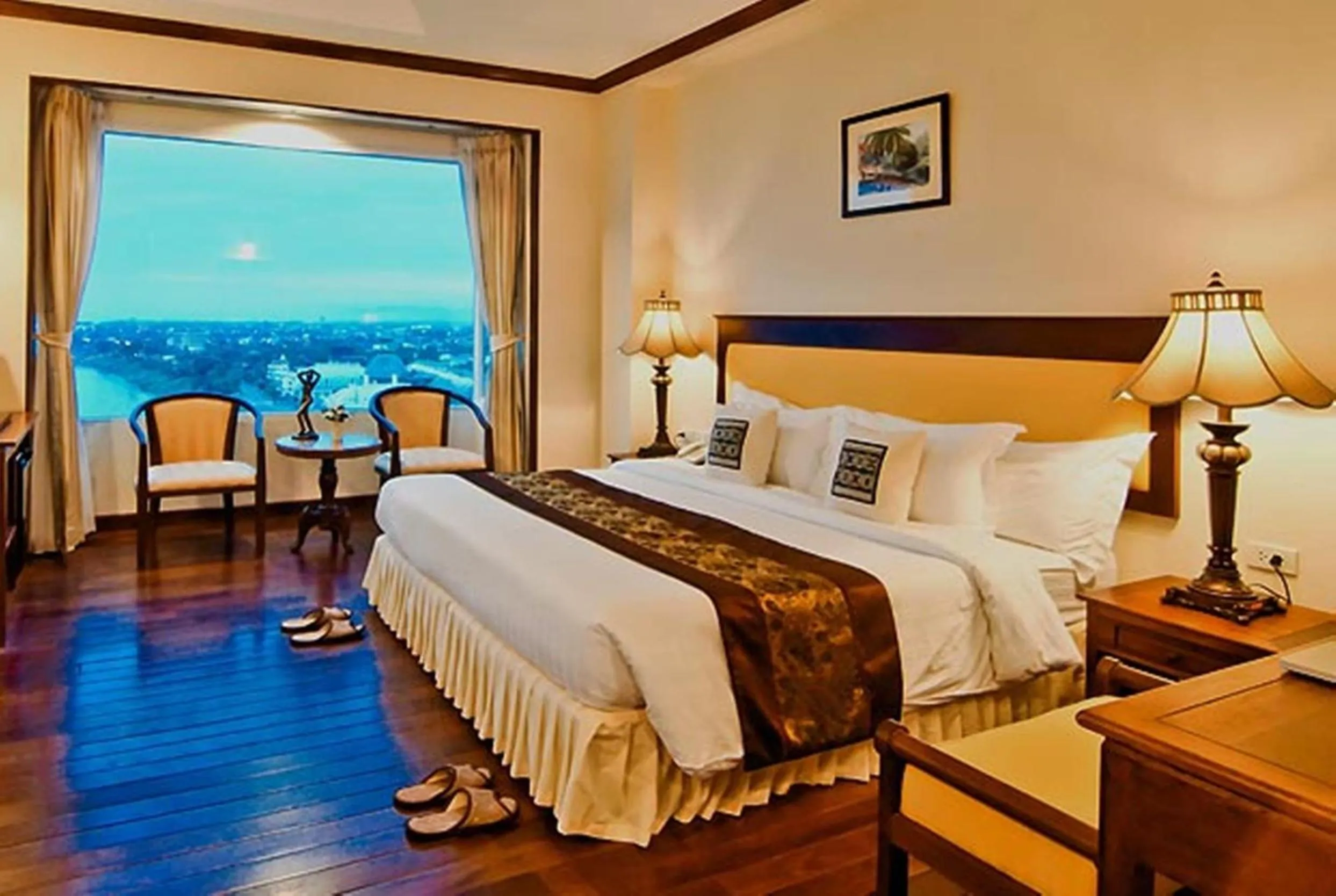 Bed in Champasak Grand Hotel