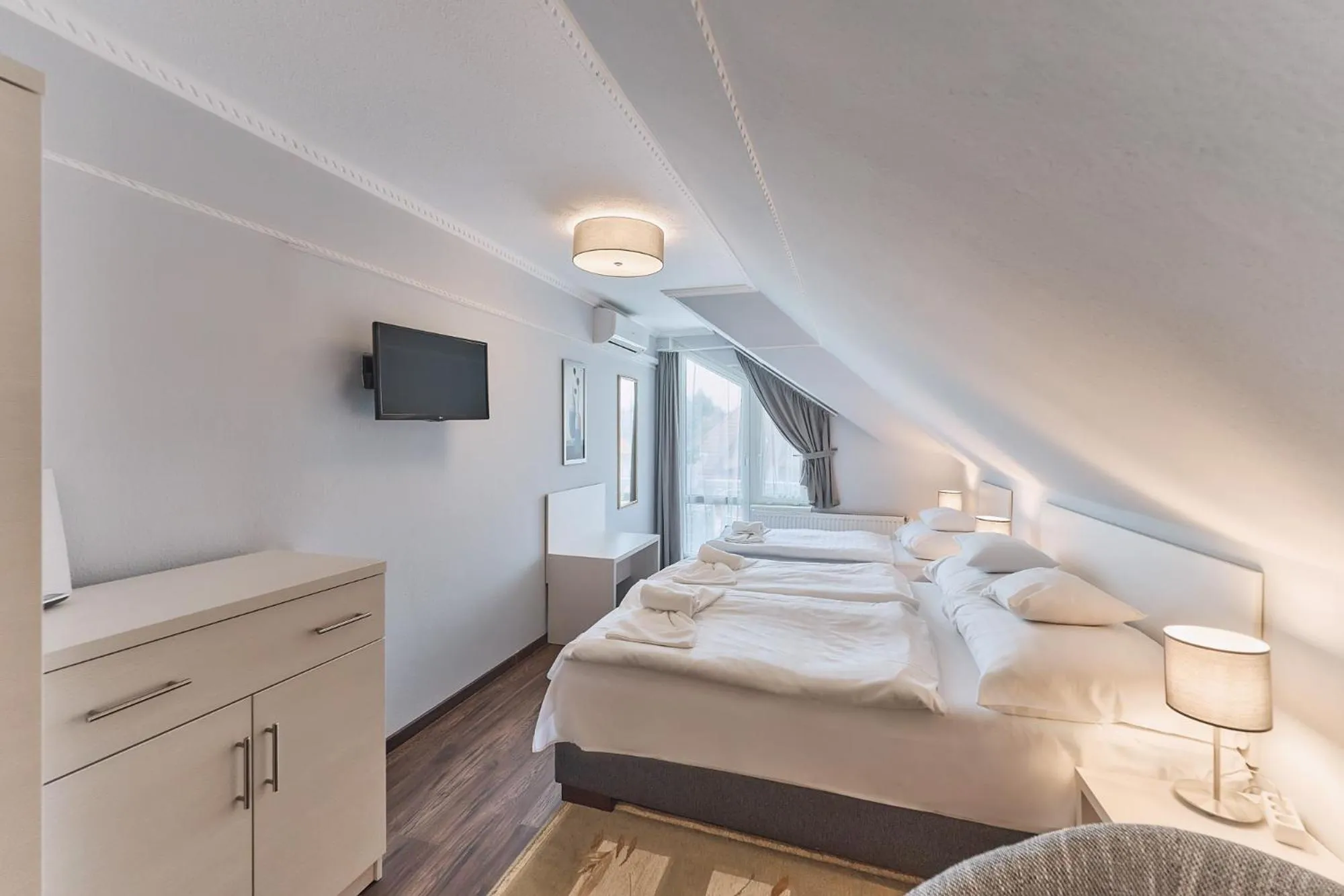 Bed in Tokajer Wellness Panzió