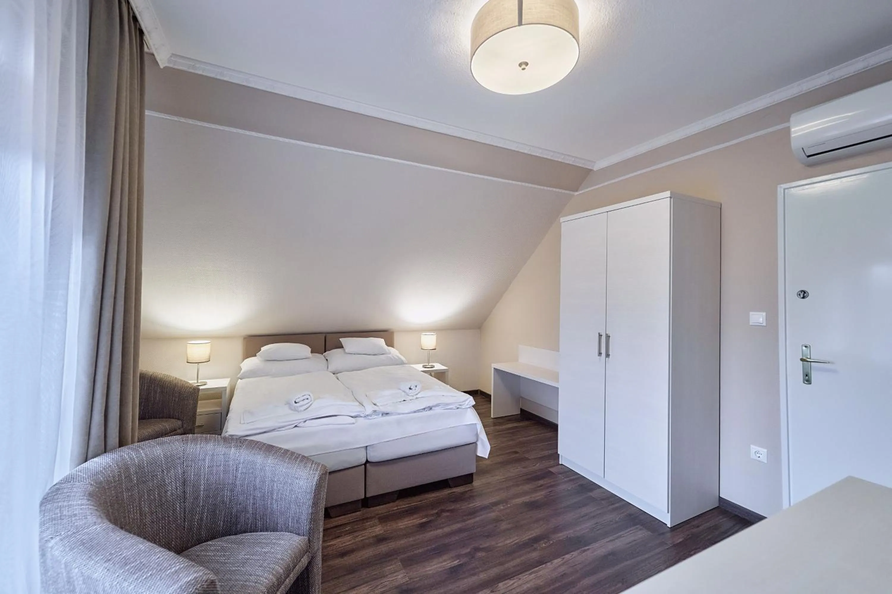 Bed in Tokajer Wellness Panzió