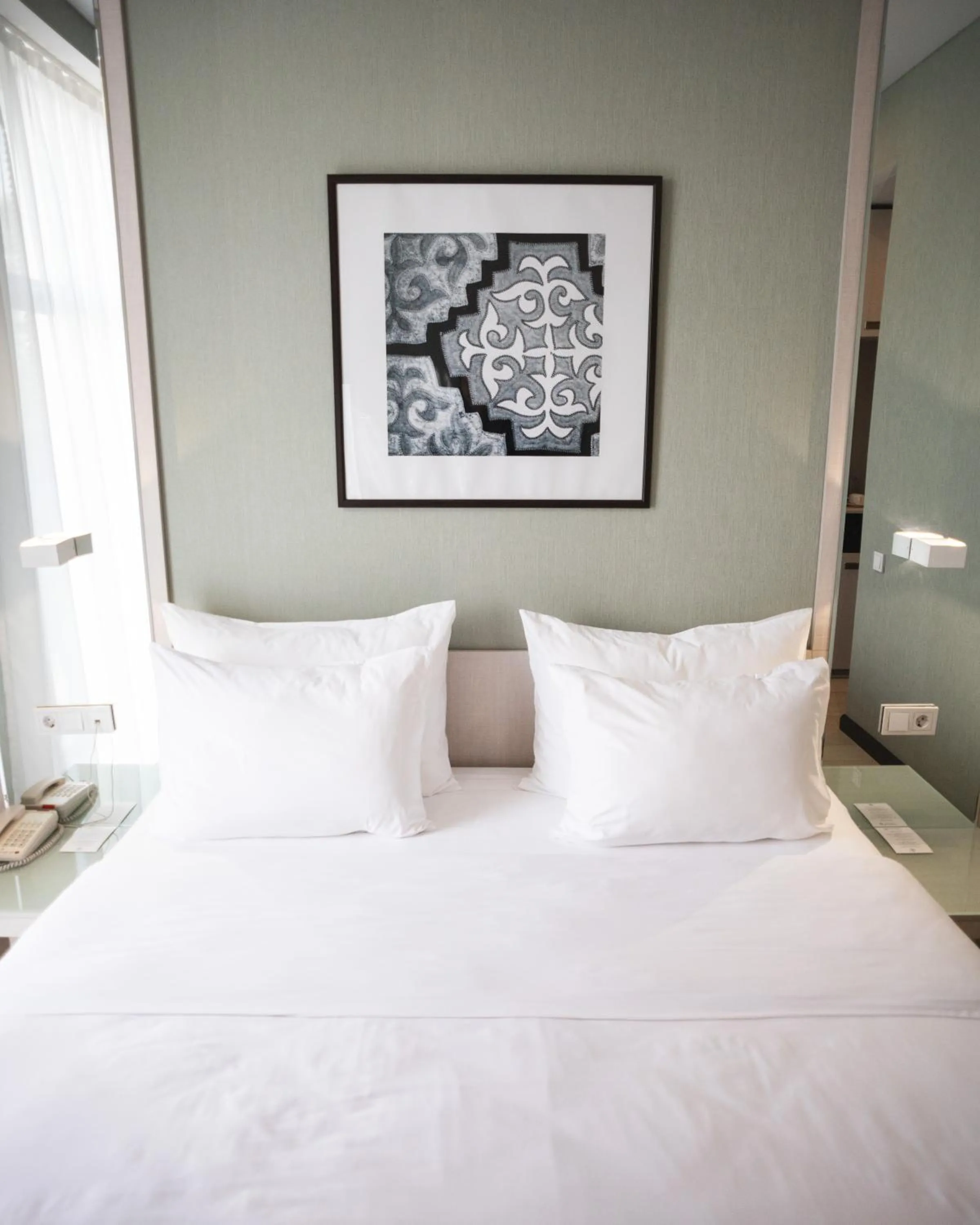 Bed in Resident City Hotel