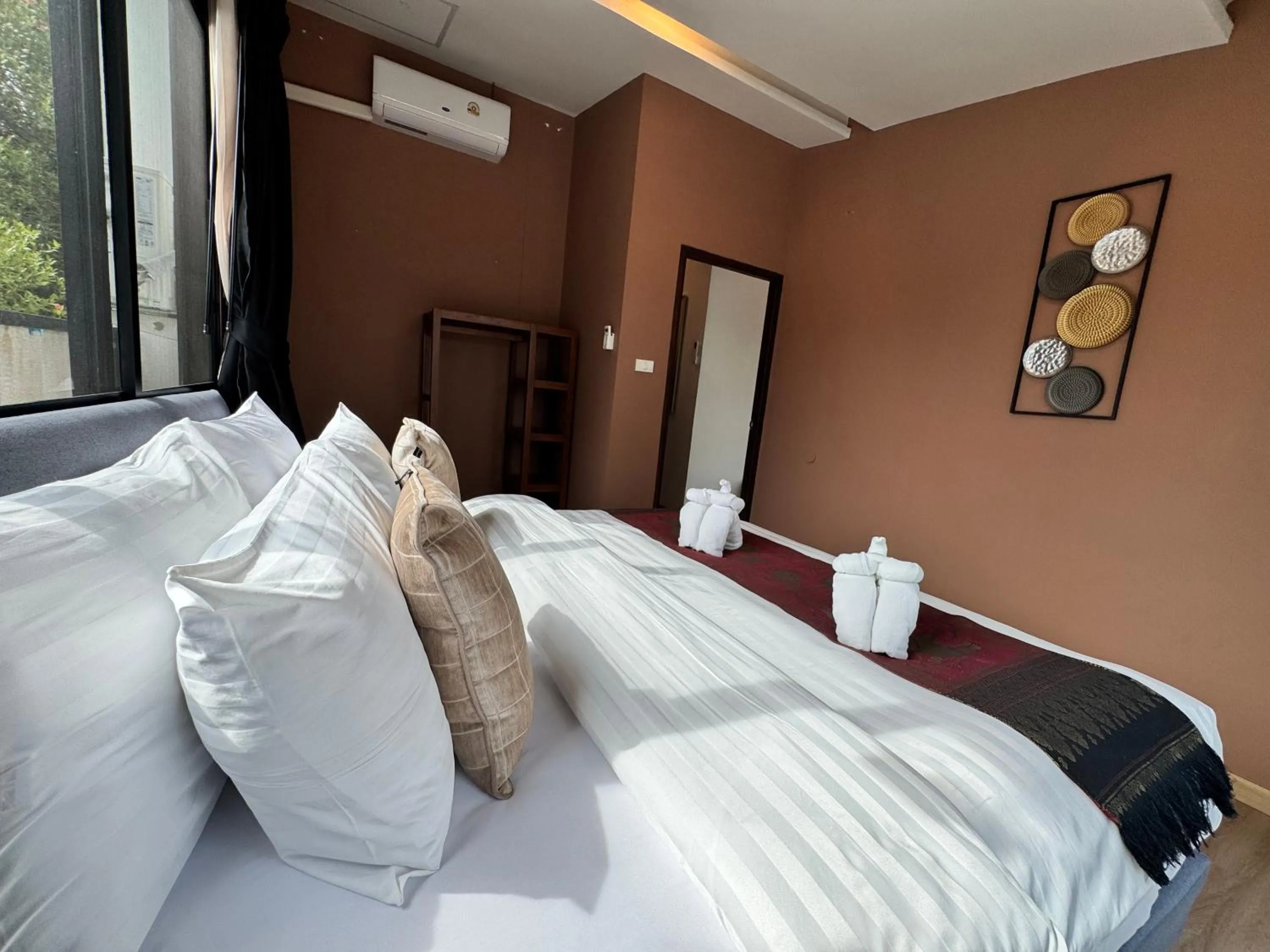Bed in Naiyang Discovery Beach Resort