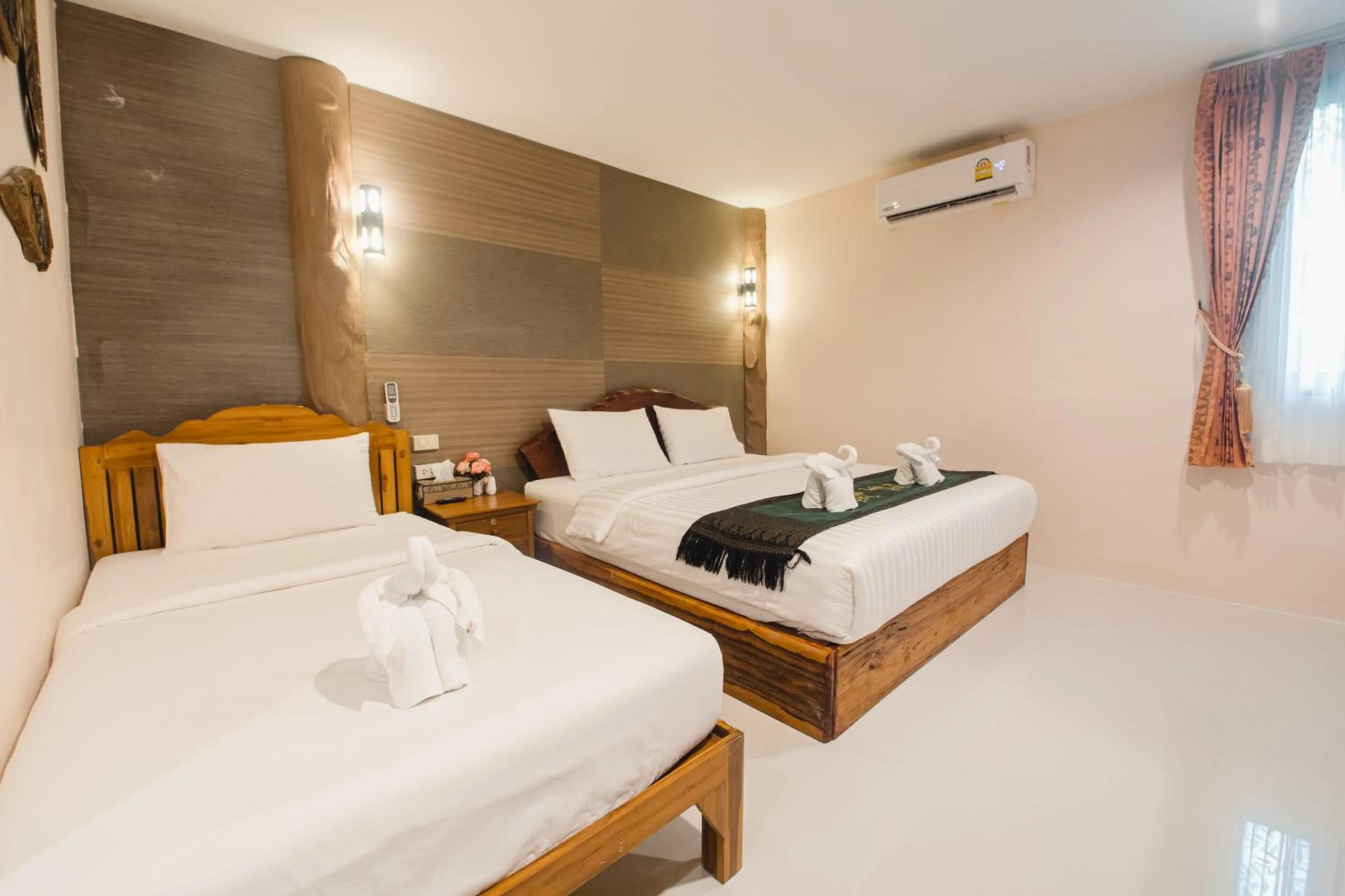 Bed in Naiyang Discovery Beach Resort