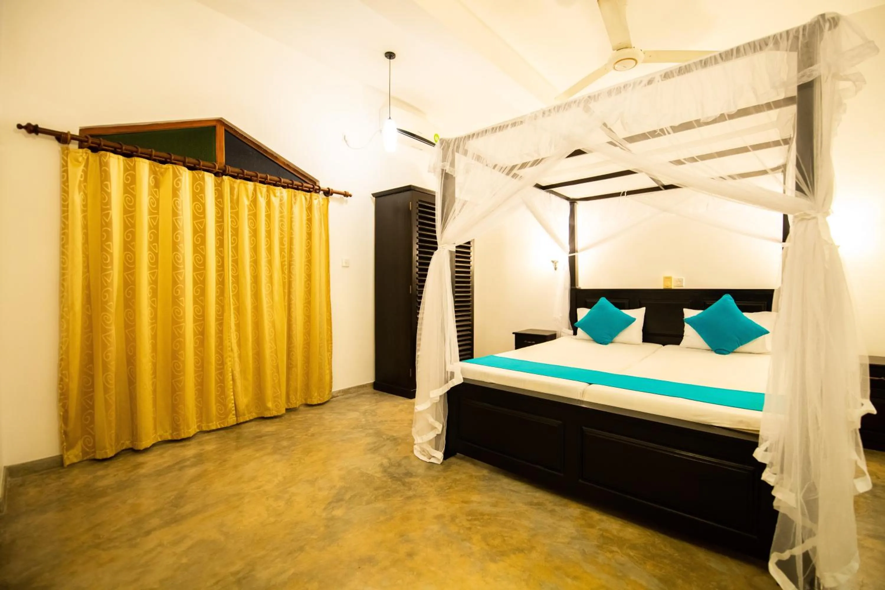 Bed in International Beach Hotel & Restaurant