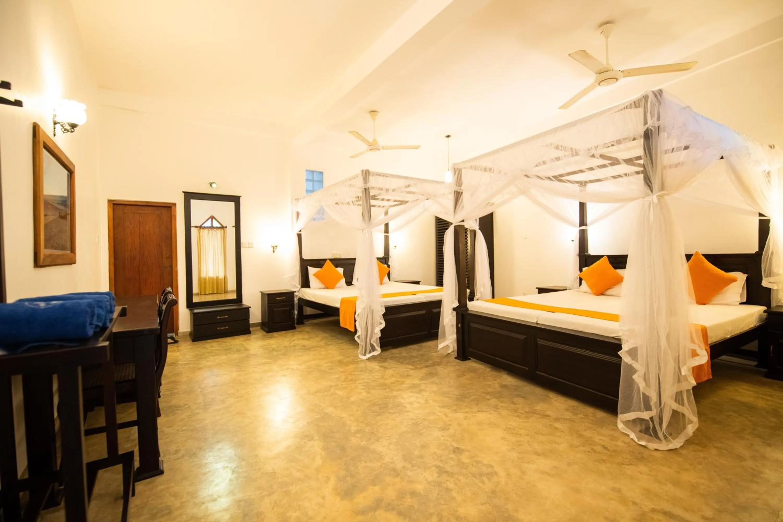 Bed in International Beach Hotel & Restaurant