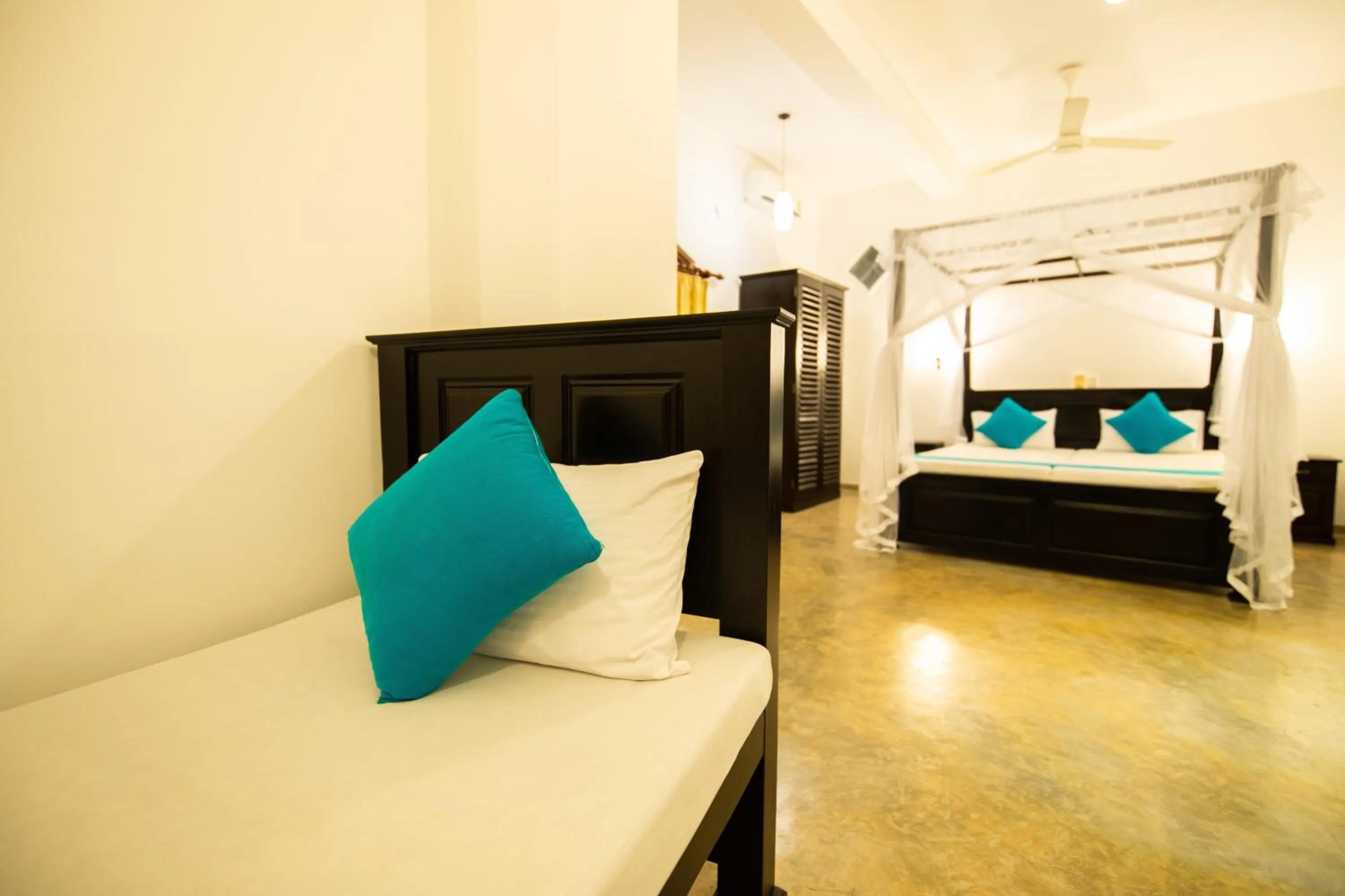 Bed in International Beach Hotel & Restaurant