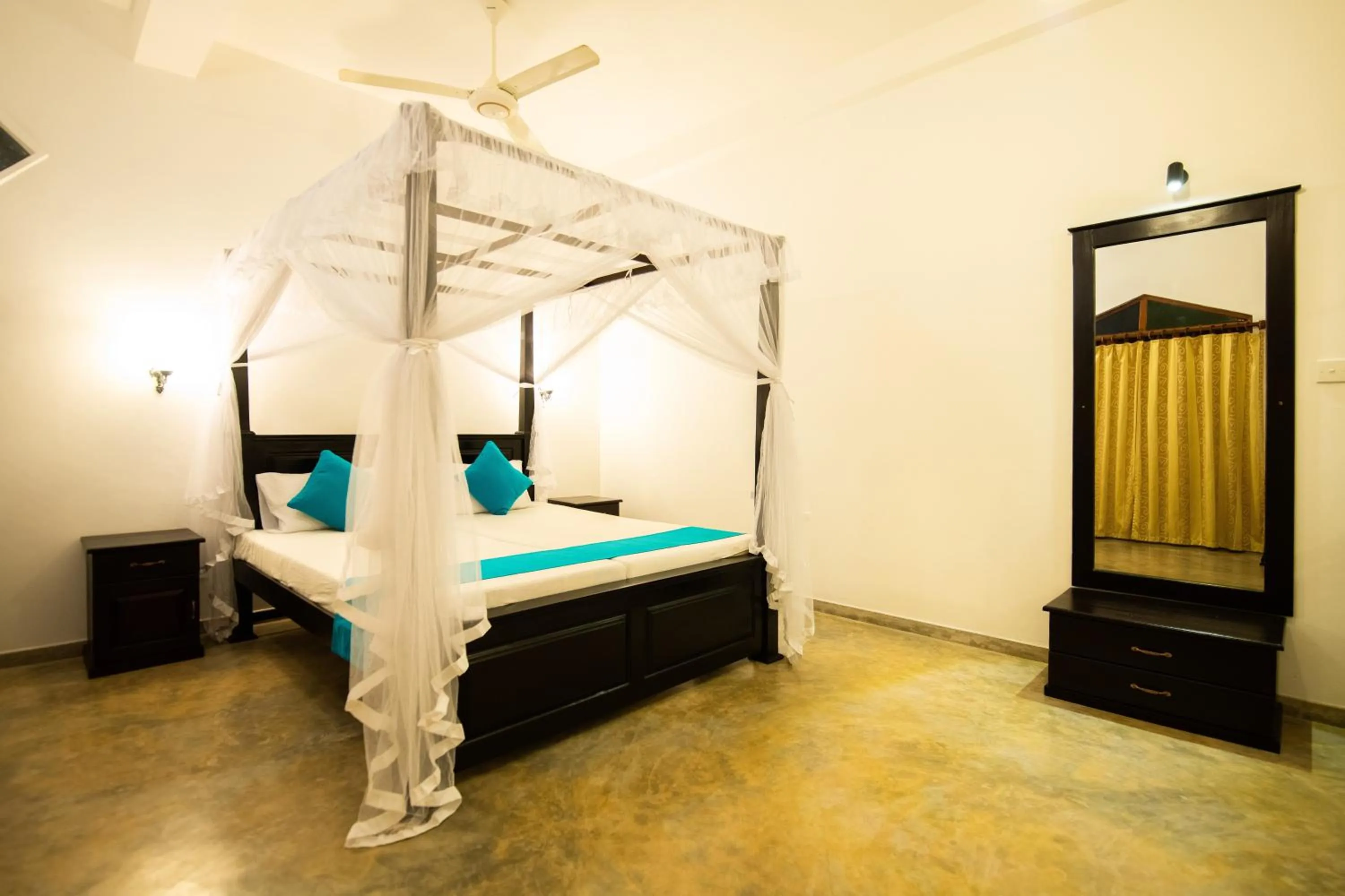 Bed in International Beach Hotel & Restaurant