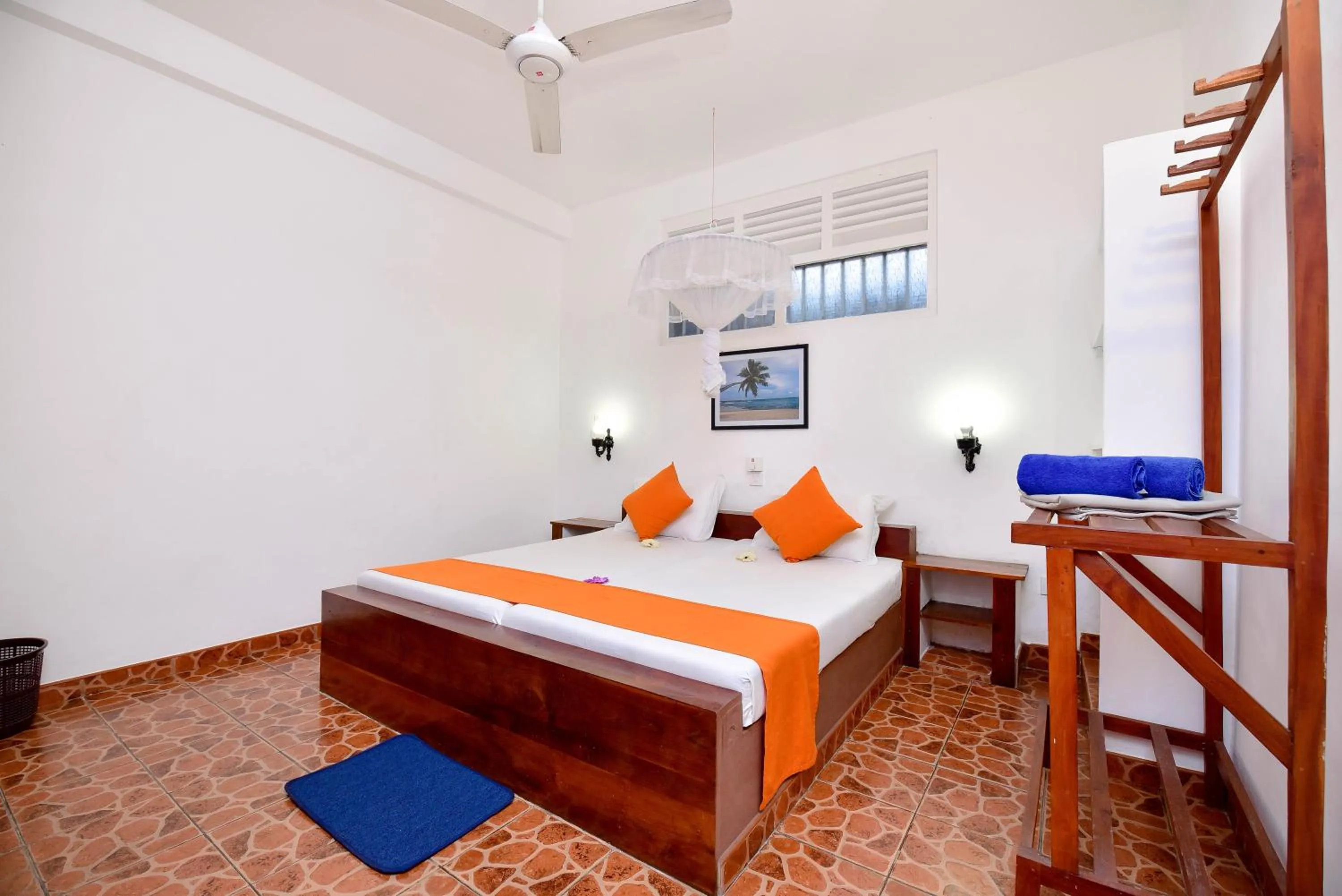 Bed in International Beach Hotel & Restaurant