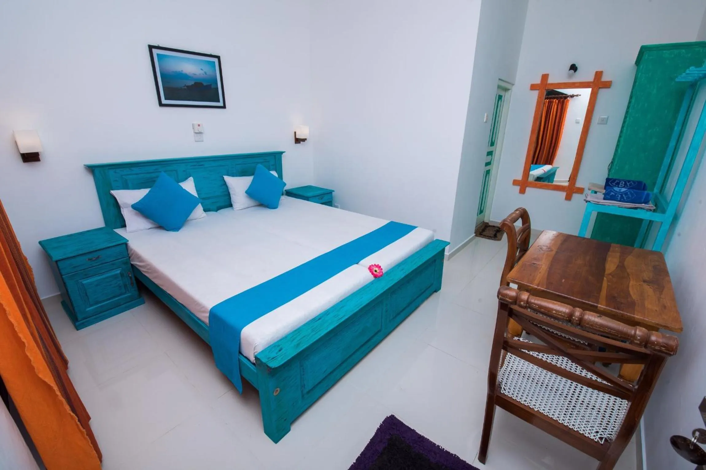 Bed in International Beach Hotel & Restaurant