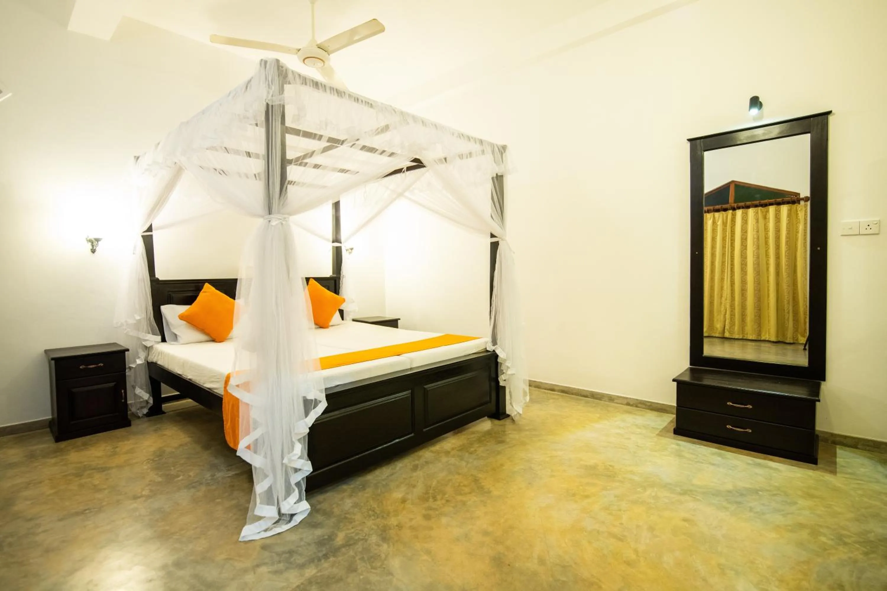 Bed in International Beach Hotel & Restaurant