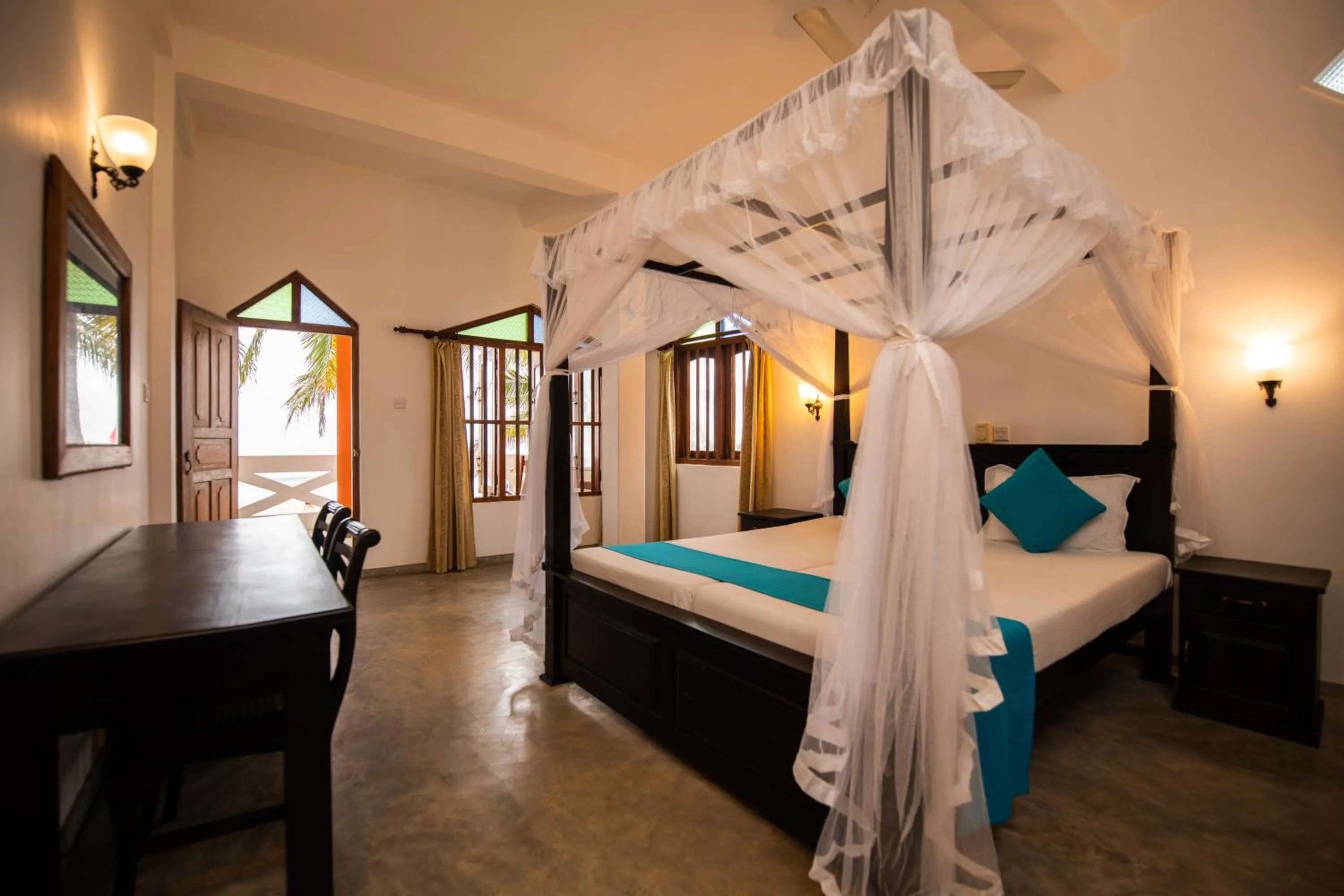 Bed in International Beach Hotel & Restaurant