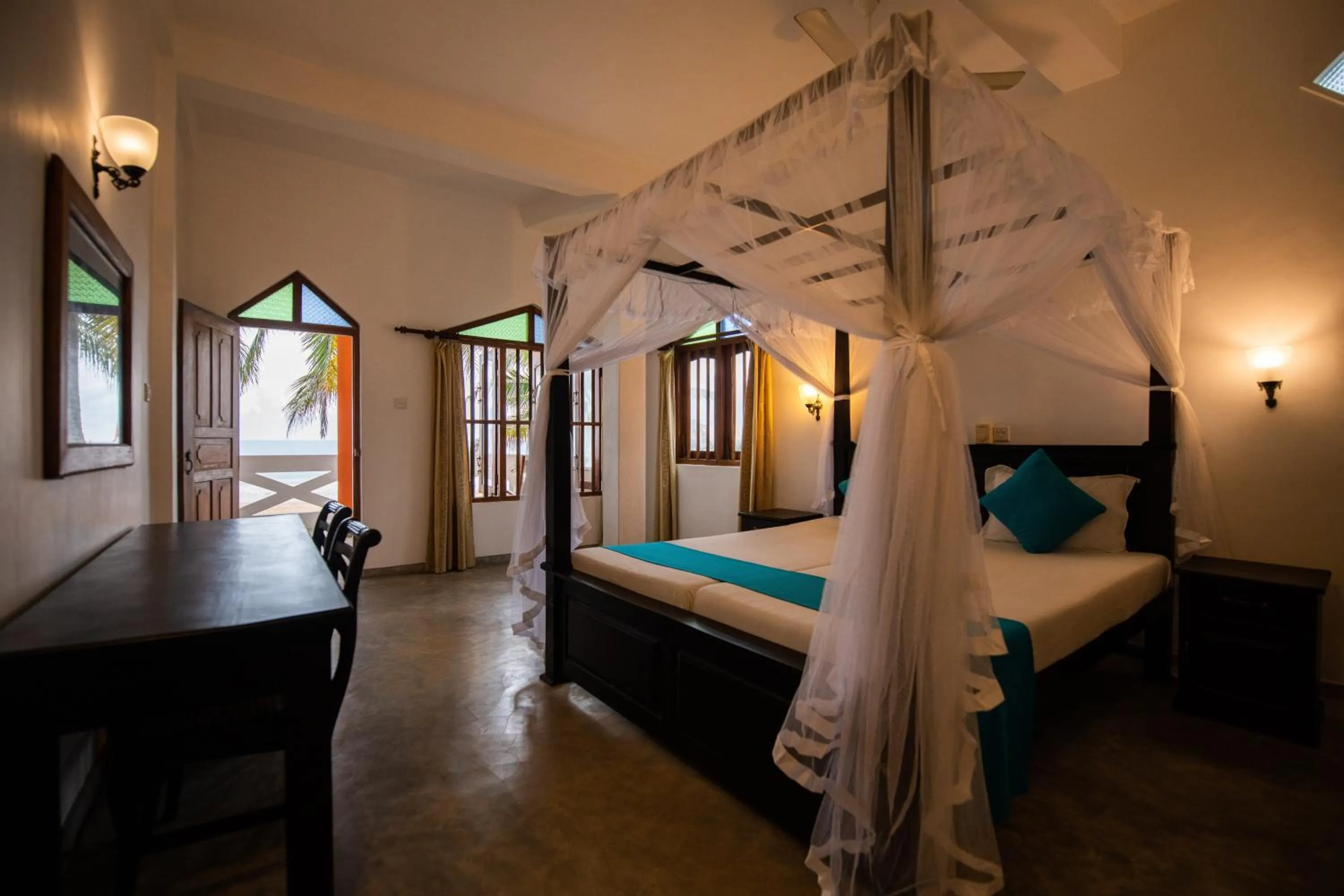 Bed in International Beach Hotel & Restaurant