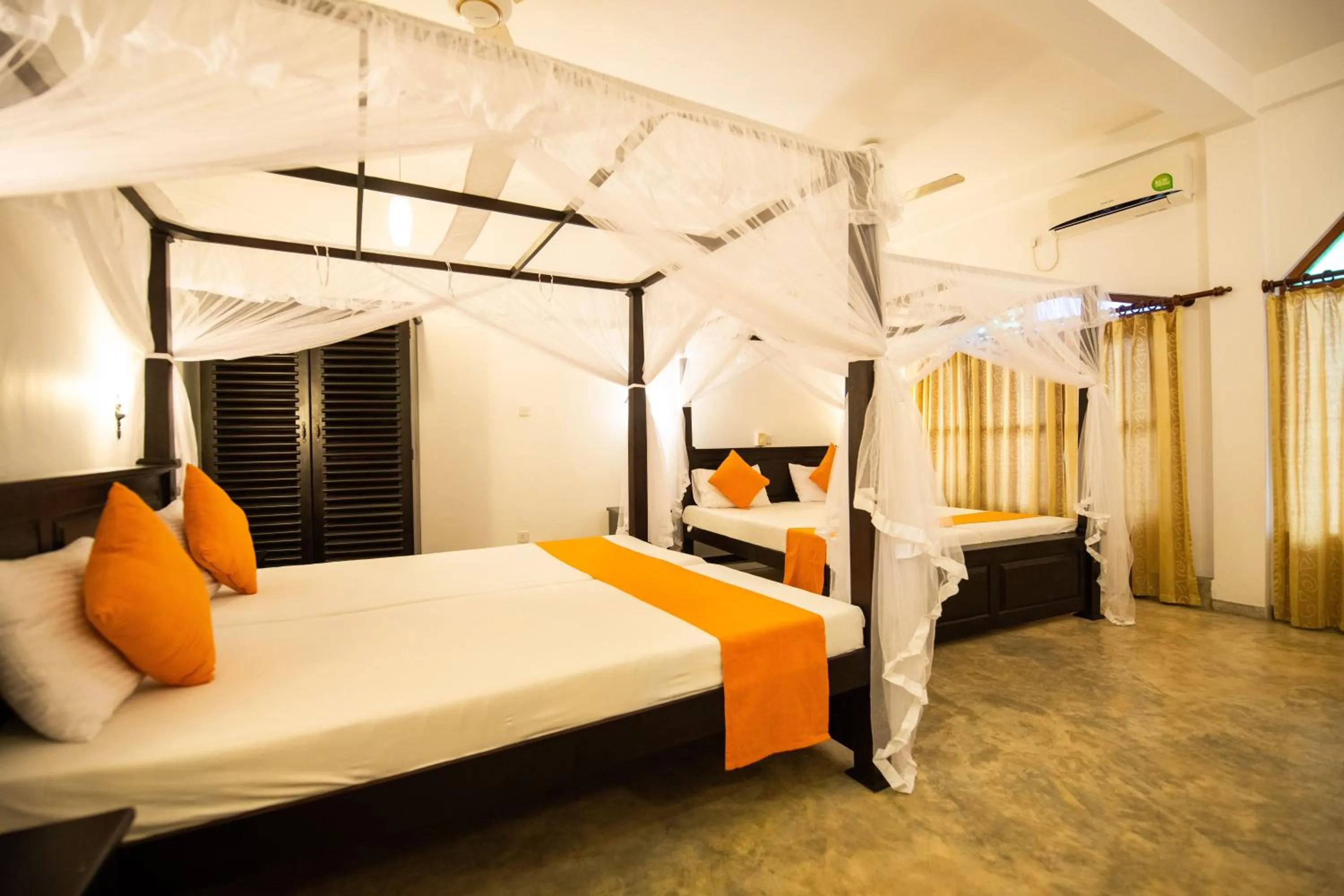 Bed in International Beach Hotel & Restaurant