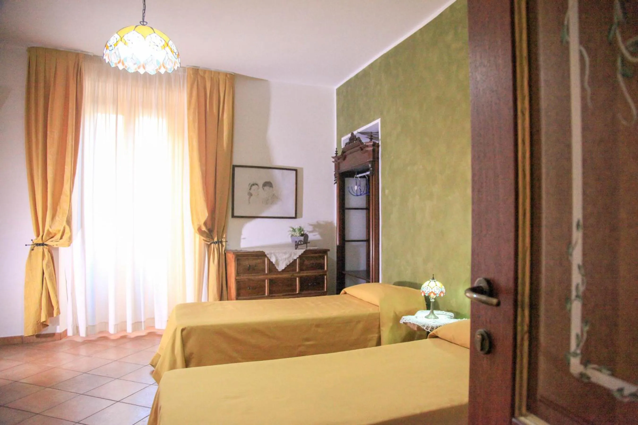 Bed in Donnaciccina Accomodation