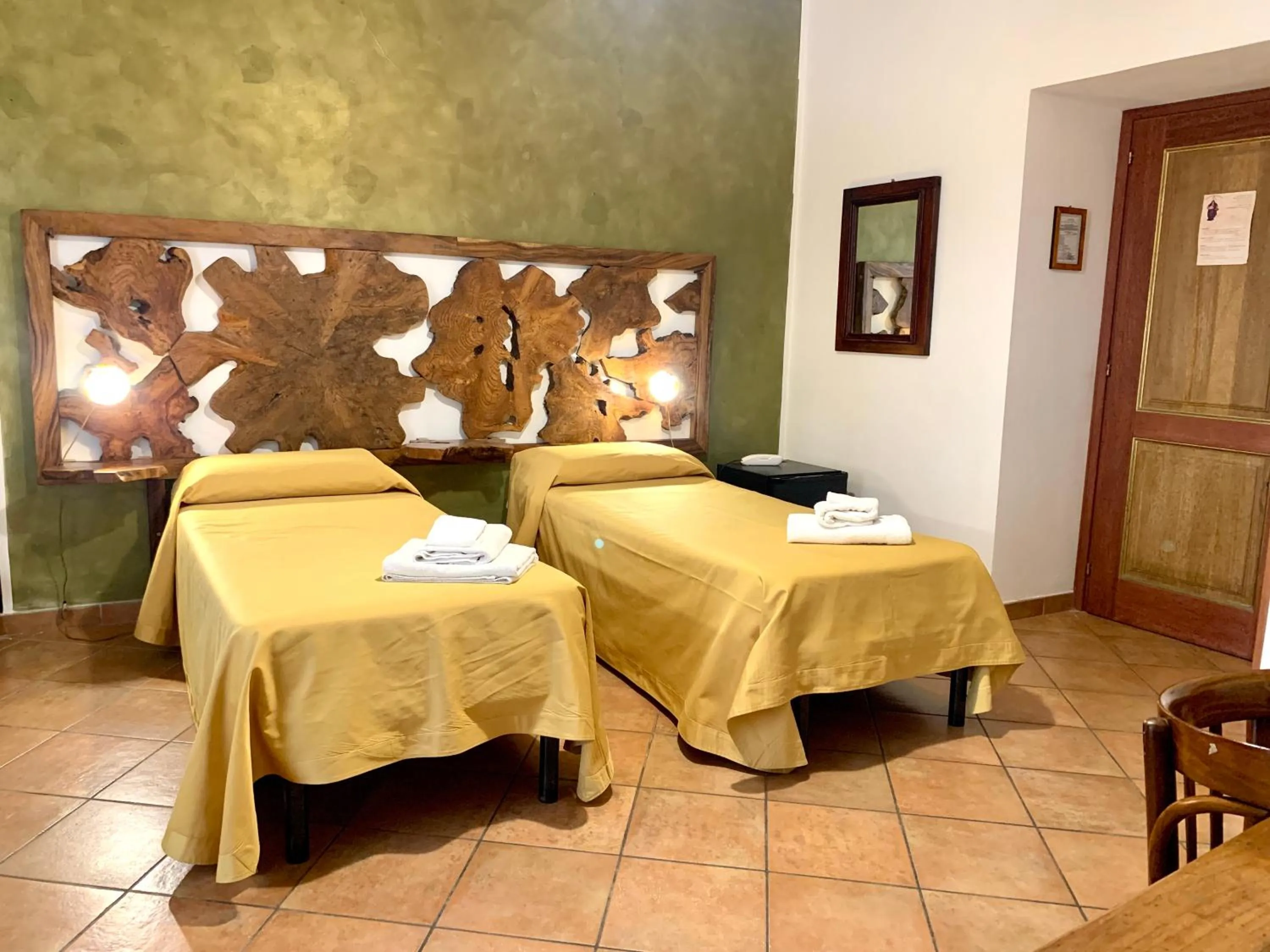 Bed in Donnaciccina Accomodation