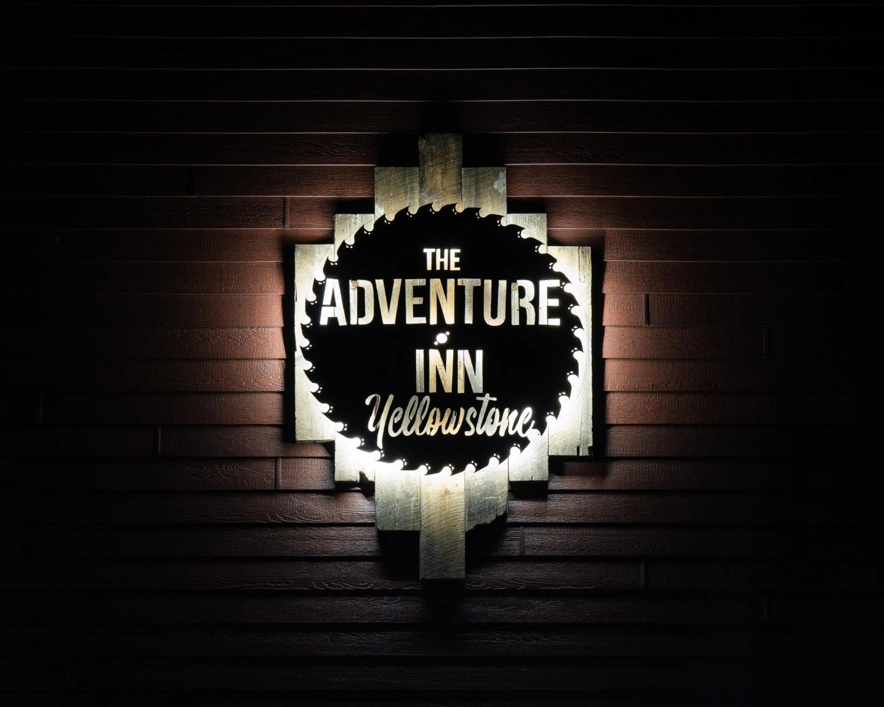 Property logo or sign in The Adventure Inn Yellowstone