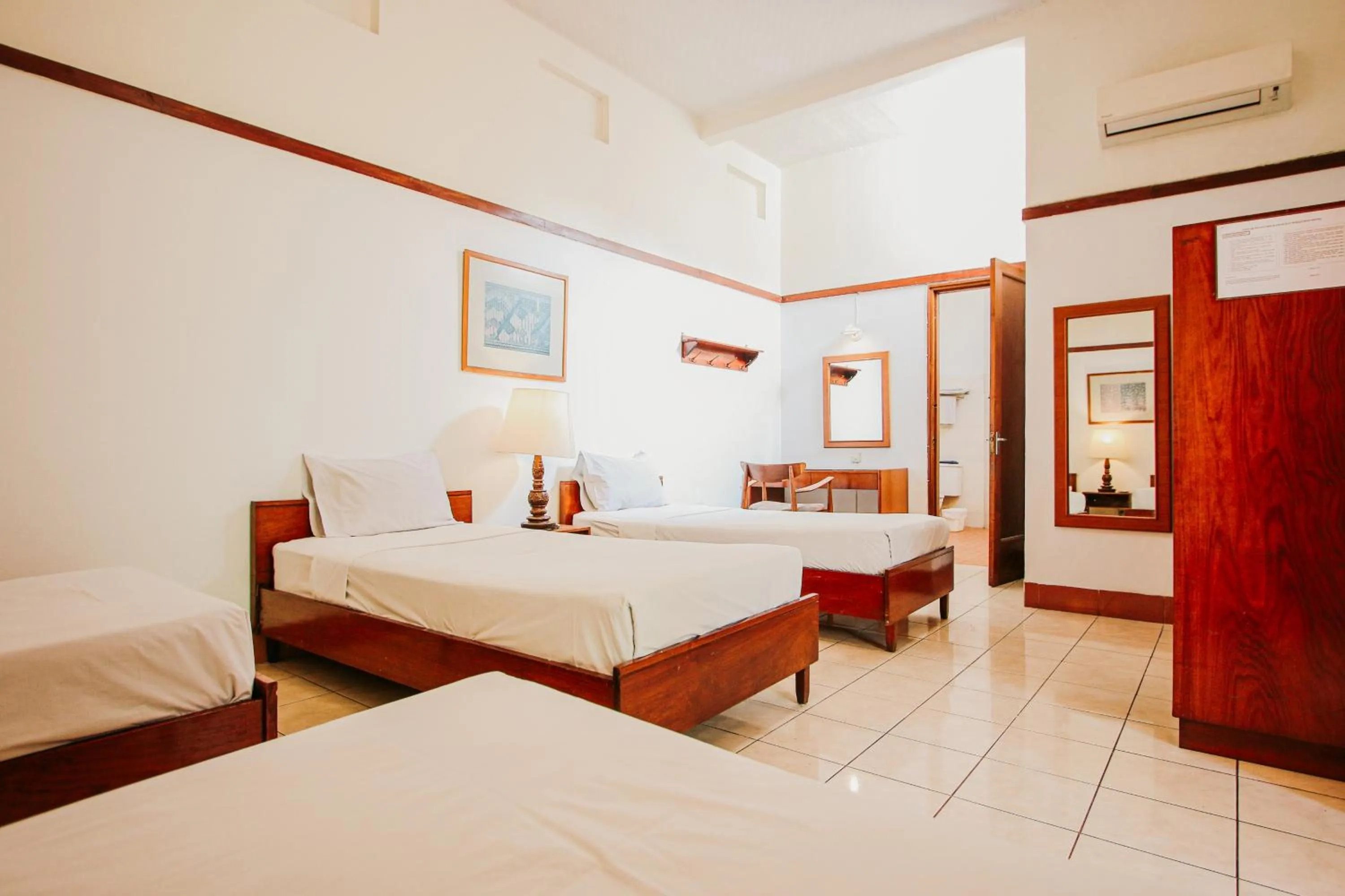 Bed in Hotel Bumi Asih Gedung Sate Bandung