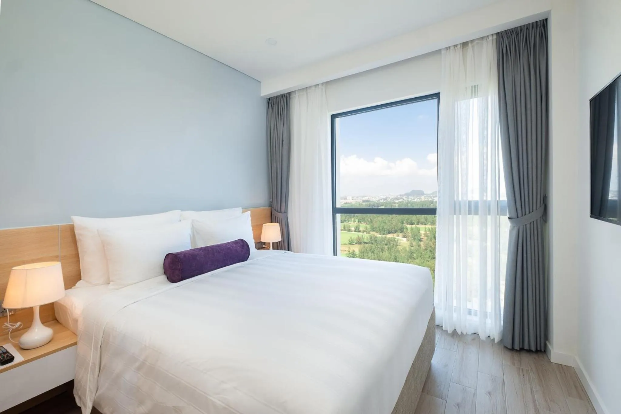 Bed in Carinae Danang Hotel