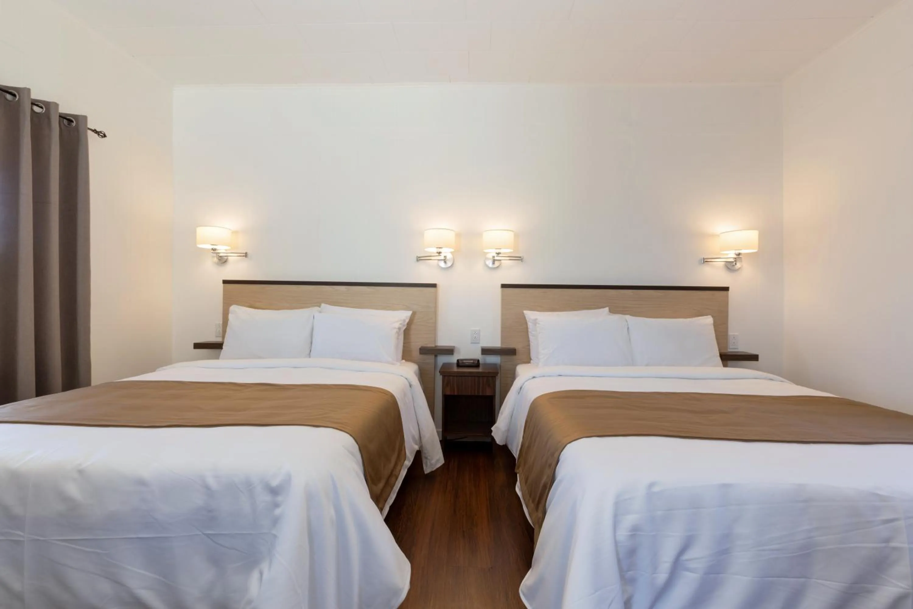 Bed in Motel au Fleuve d'Argent