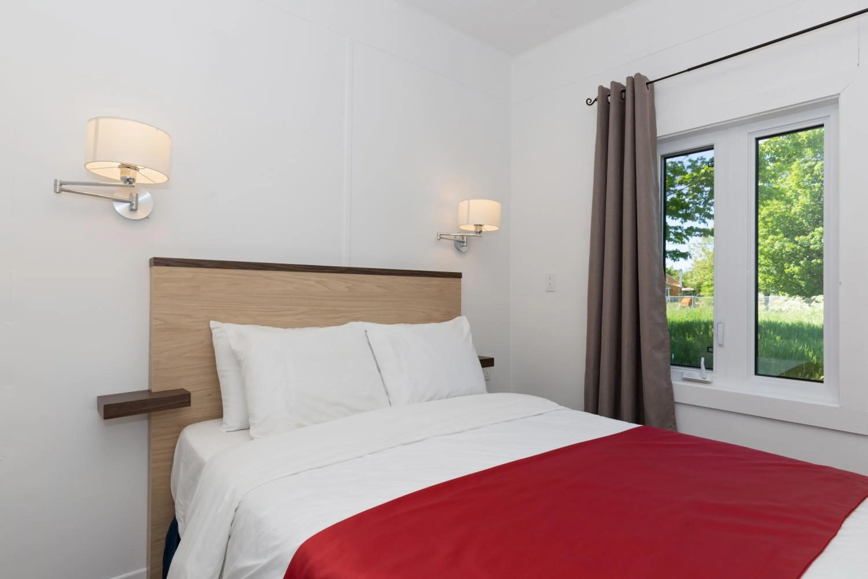 Bed in Motel au Fleuve d'Argent