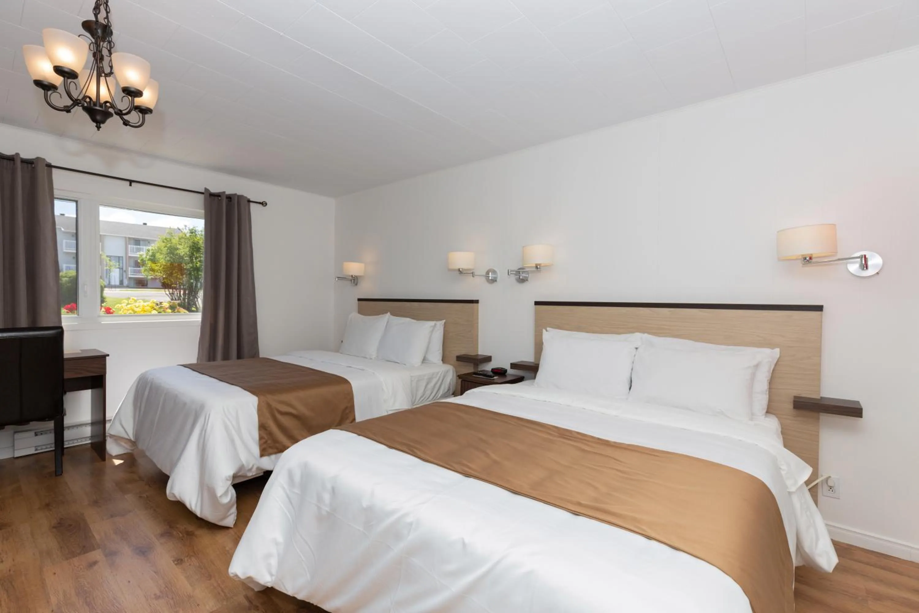 Bed in Motel au Fleuve d'Argent