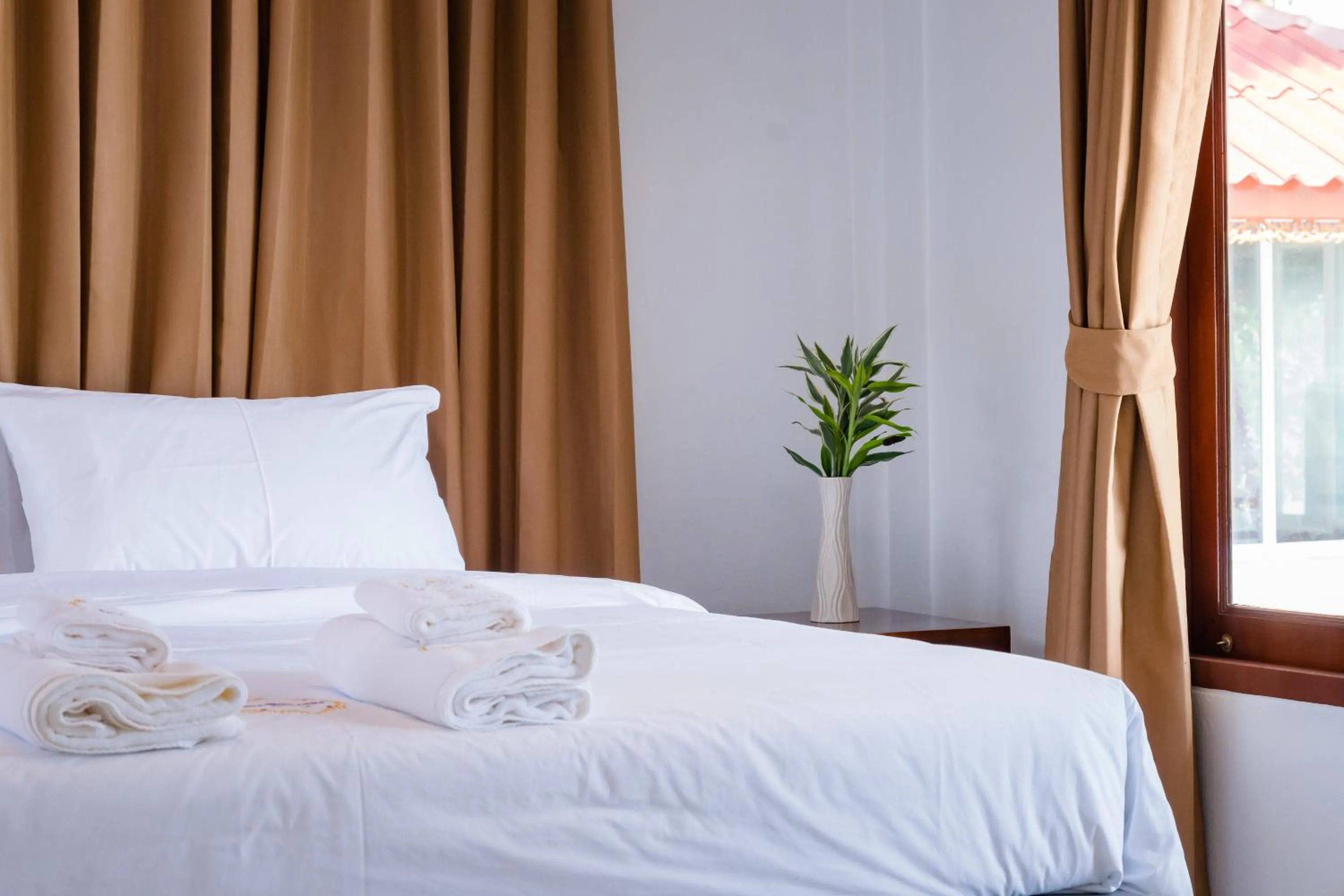 Bed in The Boutique Khanom