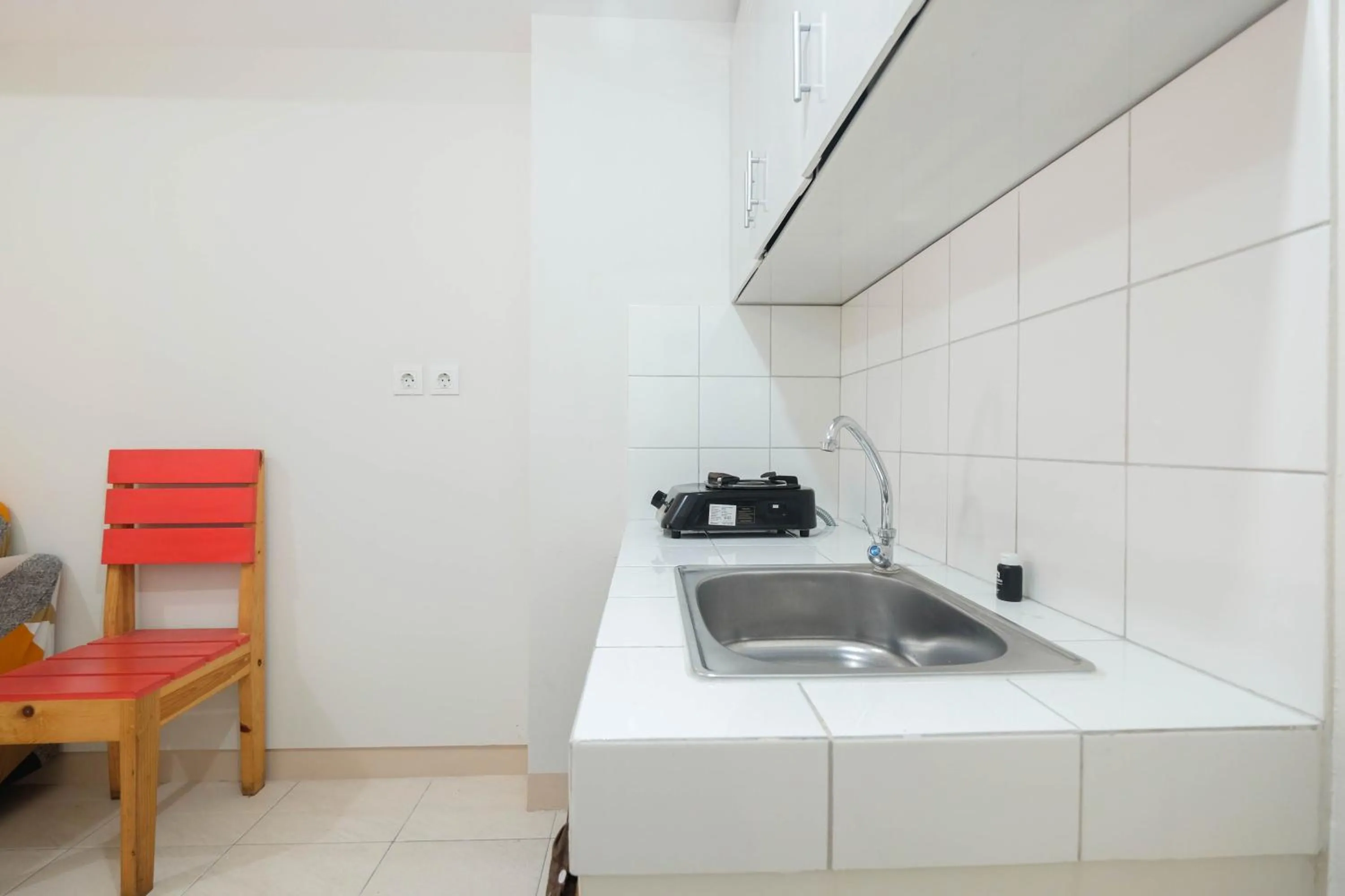 Minimalist 2BR Apartment The Springlake Summarecon By Travelio