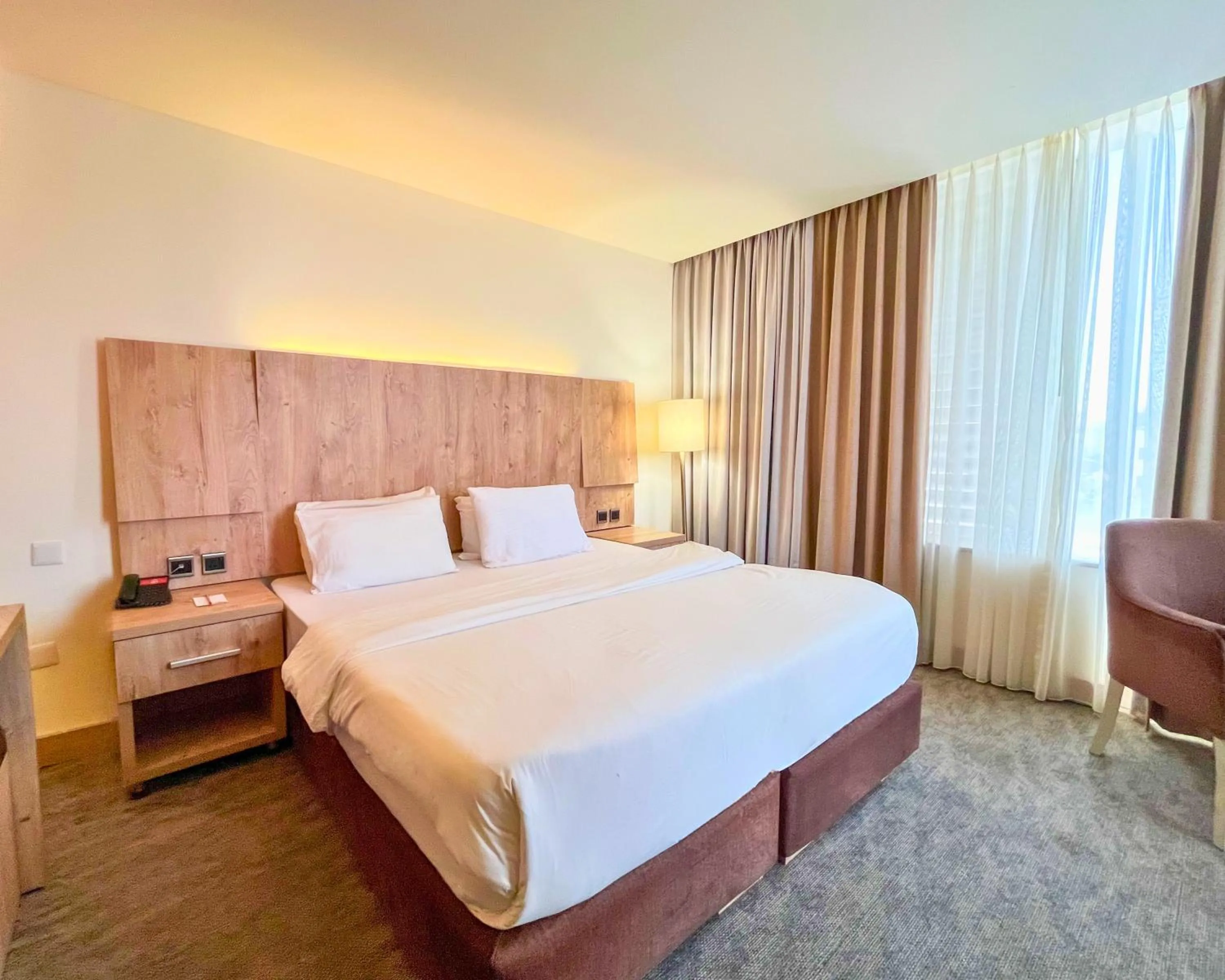 Bed in La Casa Hotel Amman by FHM