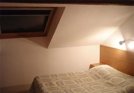 Photo of the whole room, Bed in Hotel Restaurant De La Poste Mulhouse Ottmarsheim