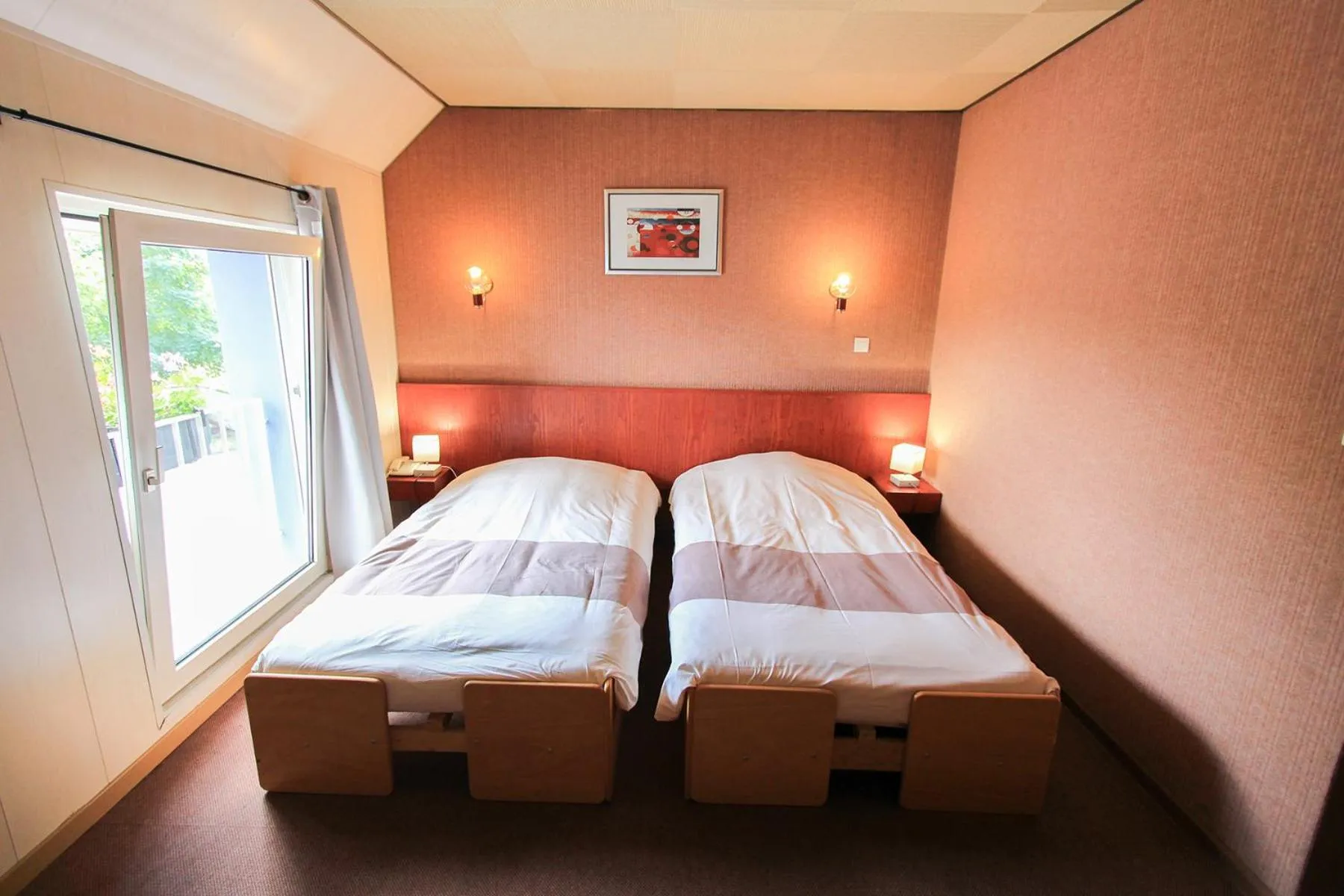 Bed in Hotel Restaurant De La Poste Mulhouse Ottmarsheim