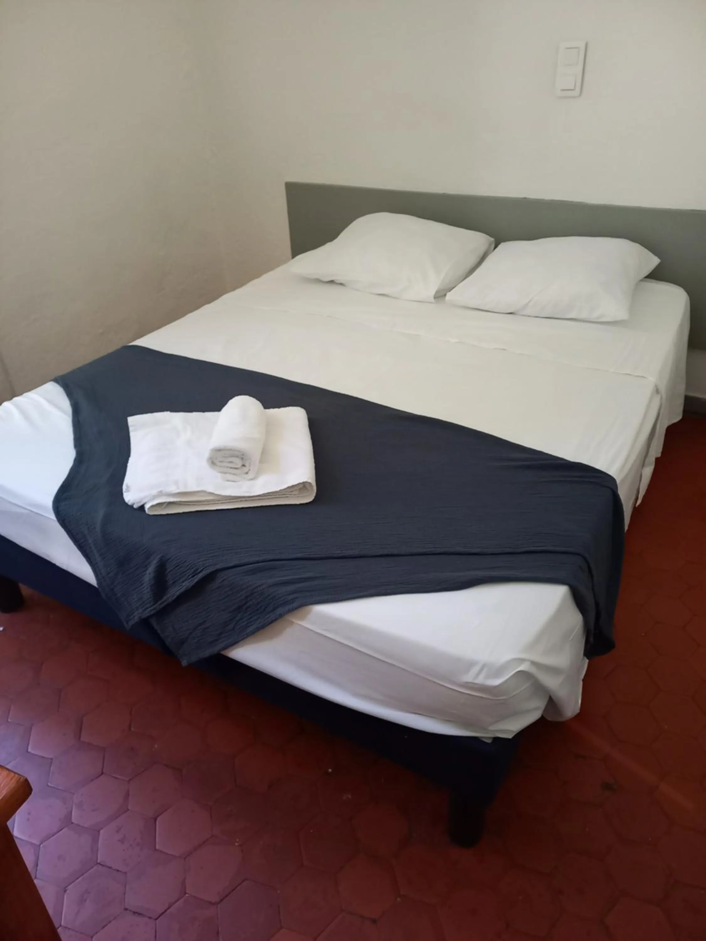 Bed in Hôtel Du Cours