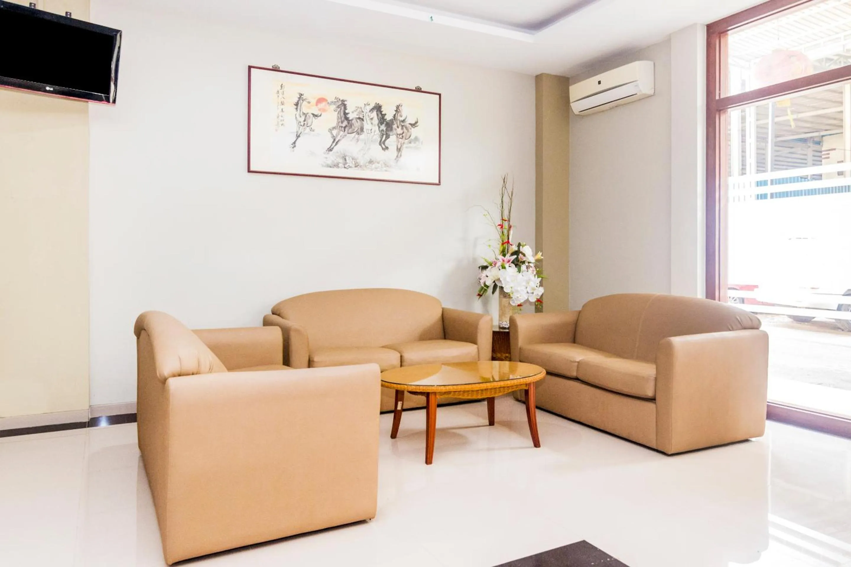 Lobby or reception in Capital O 1867 Kara Guest House