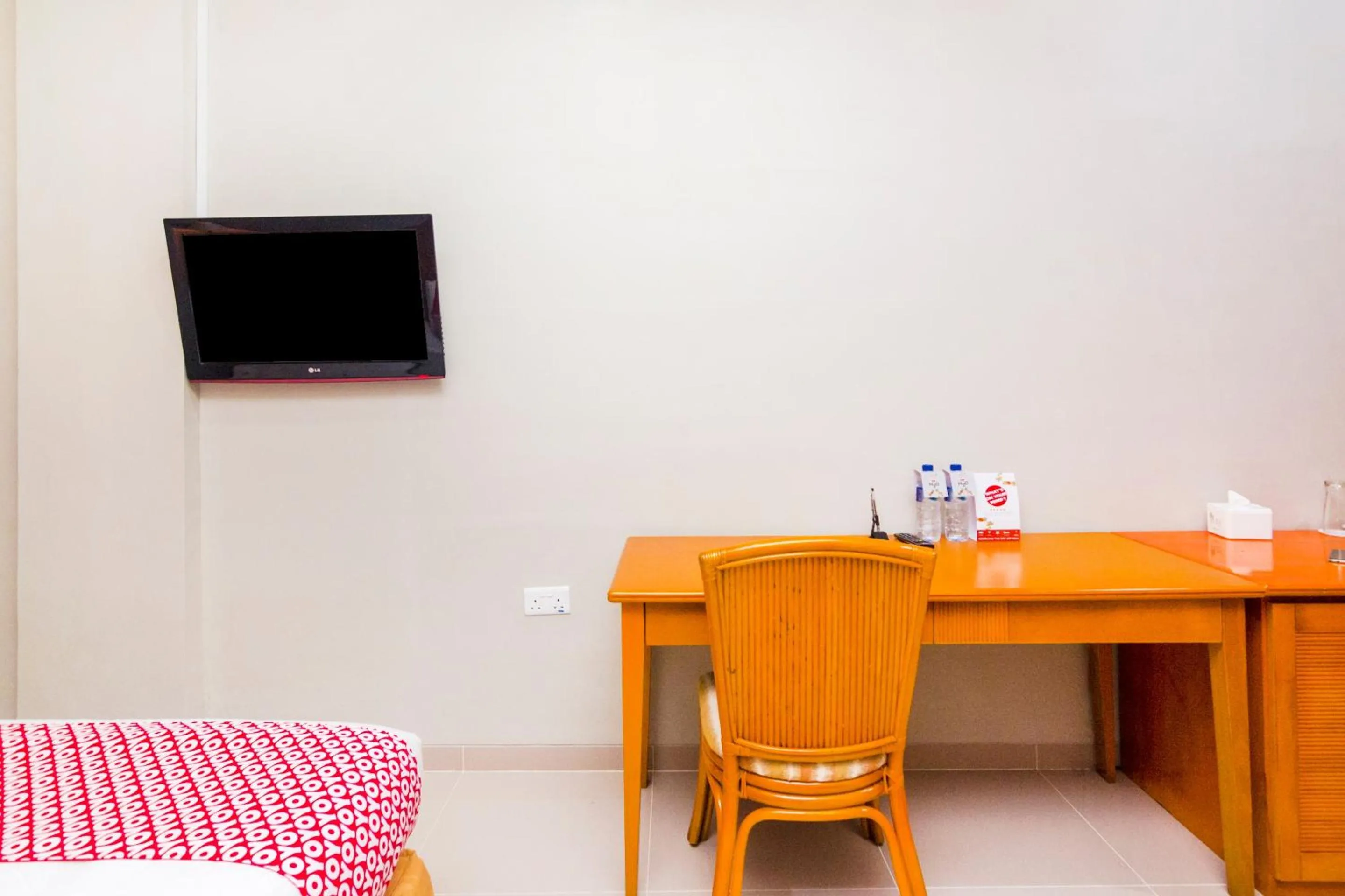 Bedroom in Capital O 1867 Kara Guest House