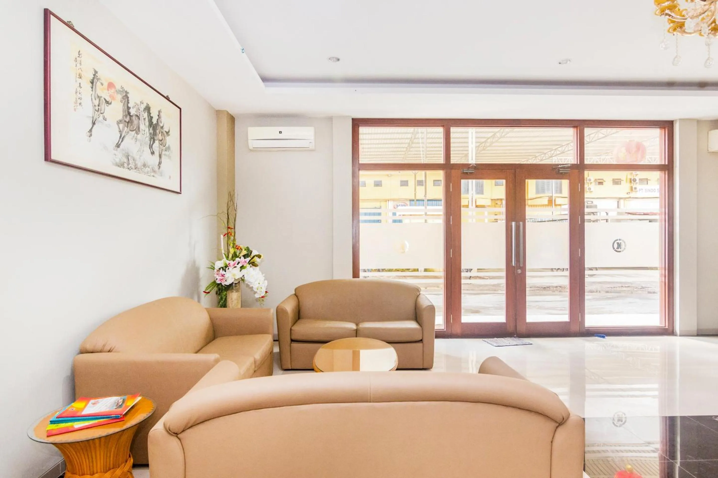 Lobby or reception in Capital O 1867 Kara Guest House