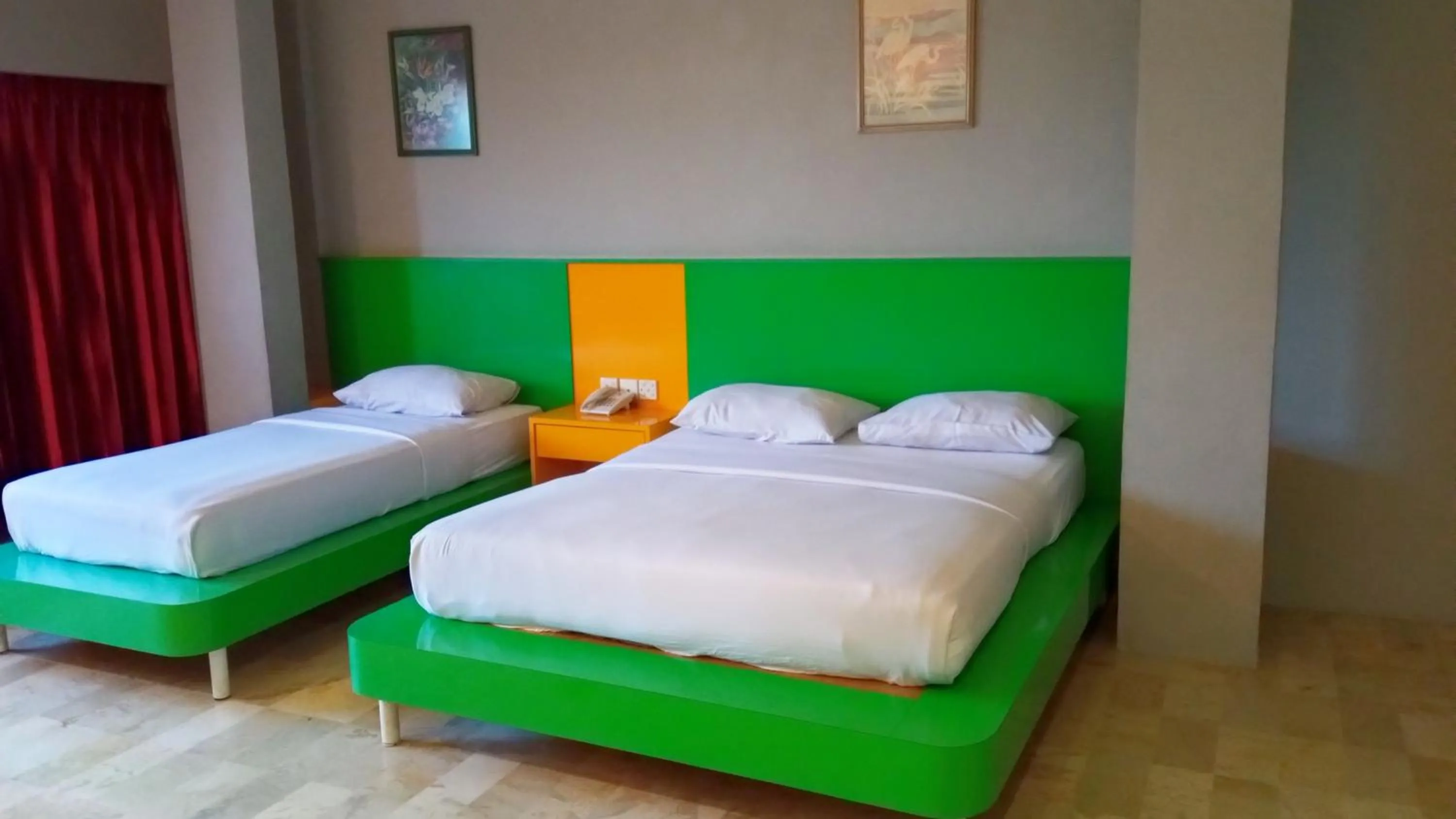 Bed in Kita Hotel
