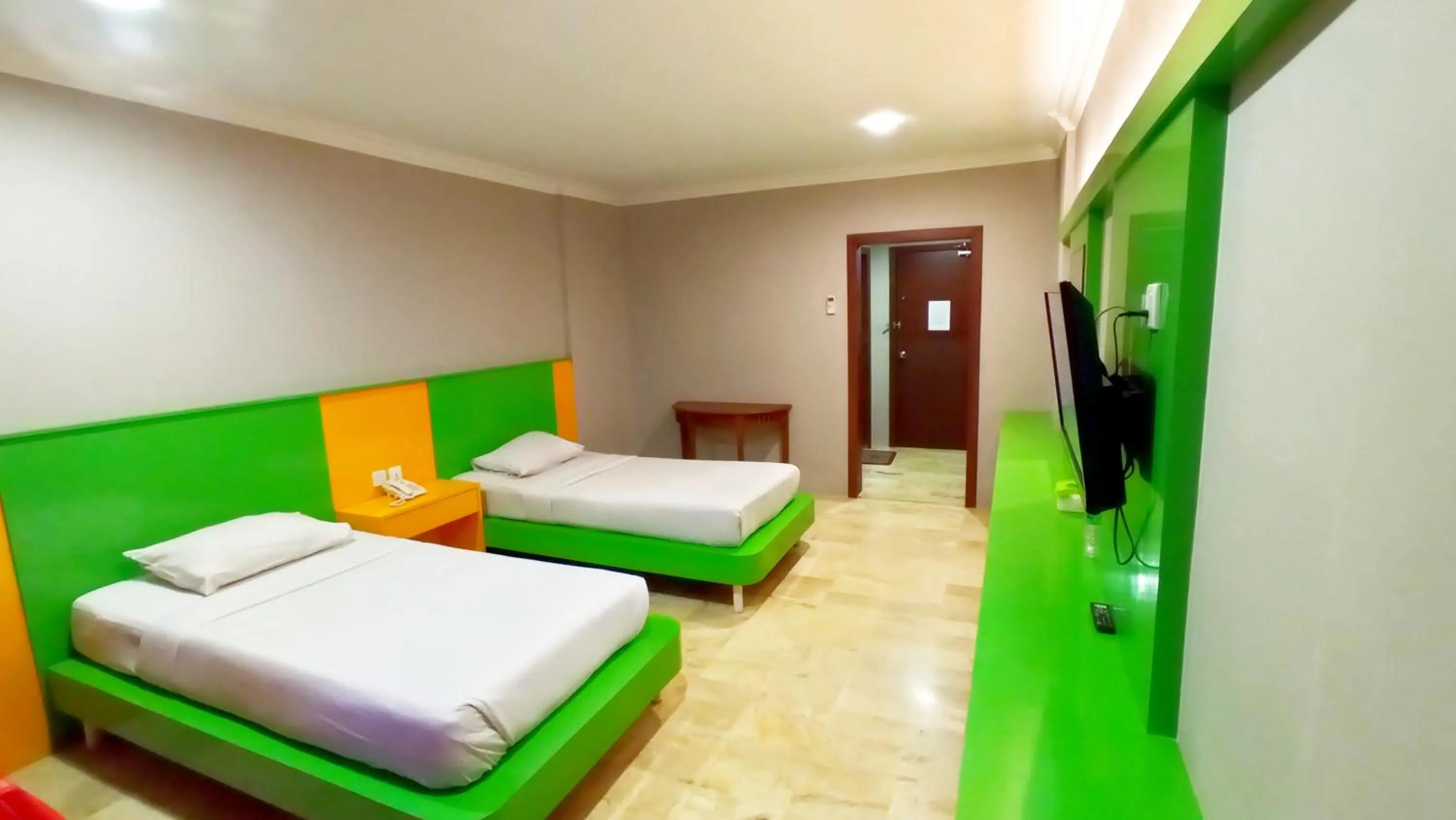 Bed in Kita Hotel