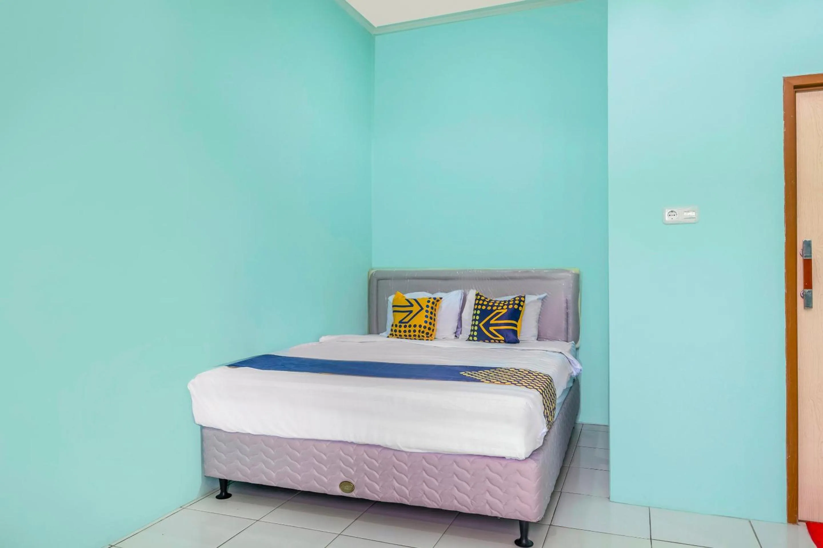 Bedroom in OYO Life 1889 Mbuahpage