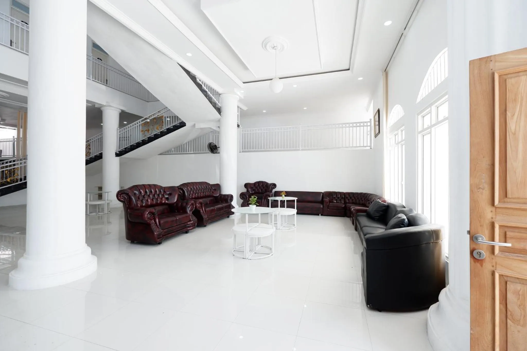 Seating area in Griya RW Family Guest House Redpartner