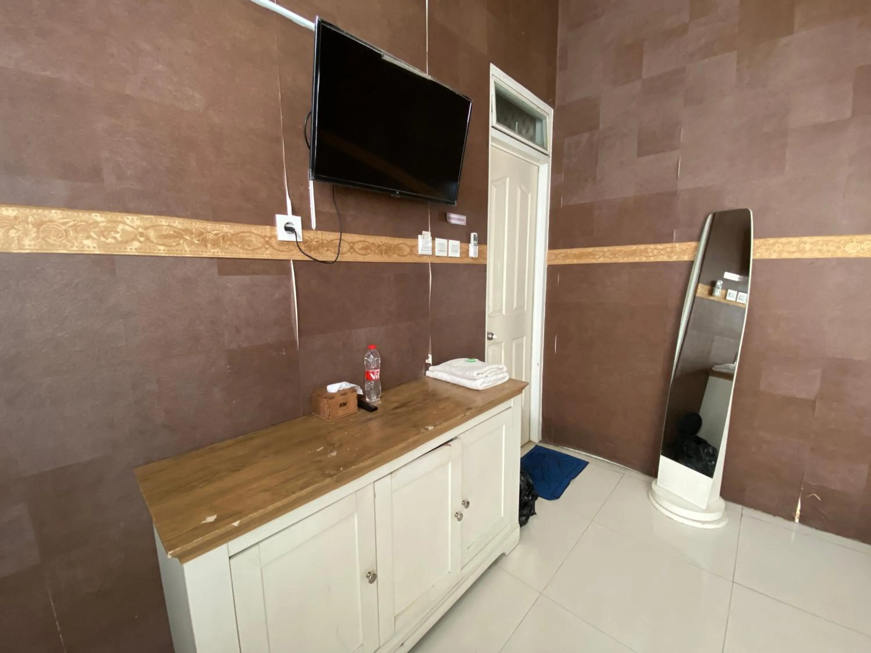 Bedroom in Griya RW Family Guest House Redpartner