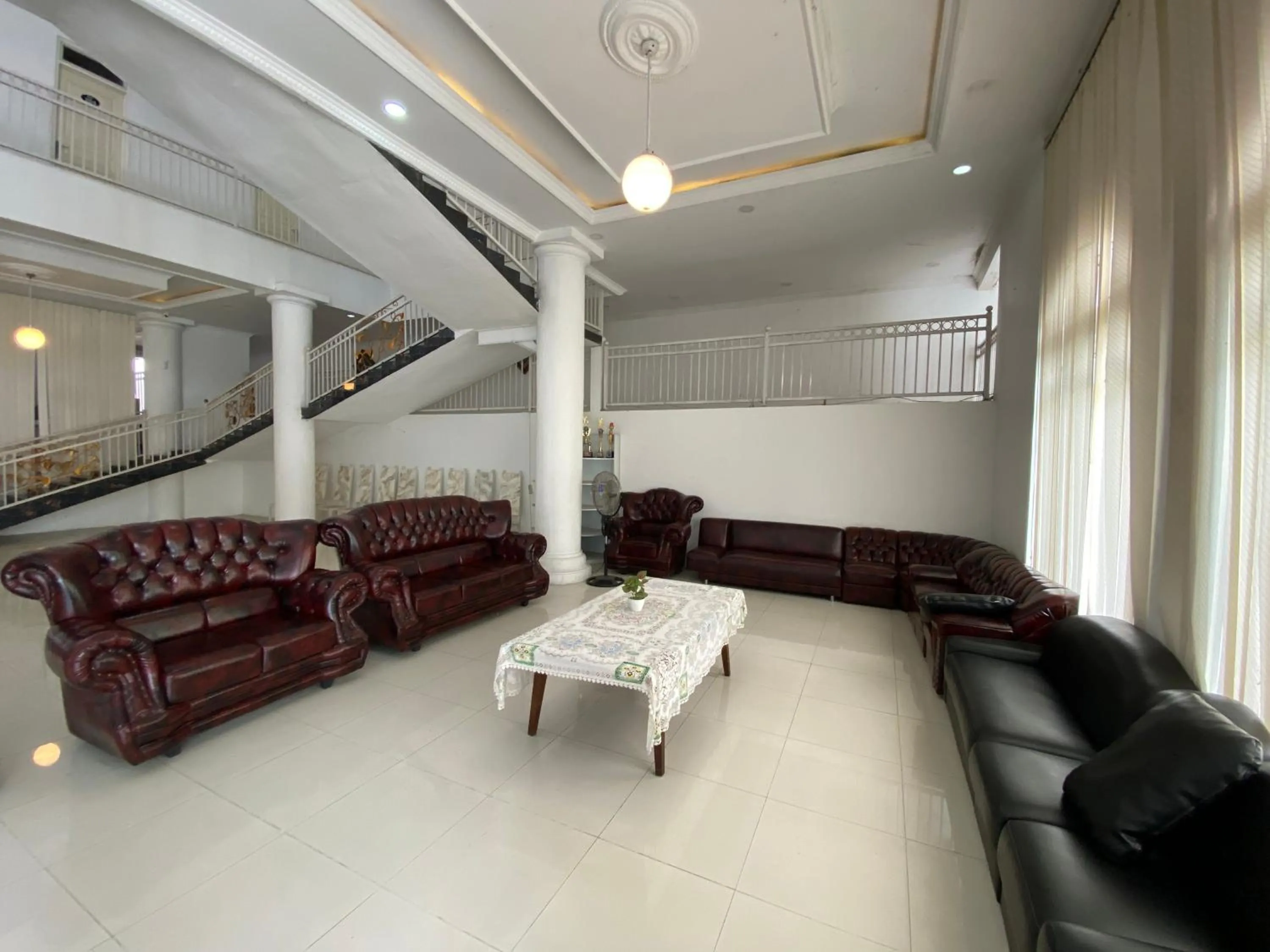 Seating area in Griya RW Family Guest House Redpartner