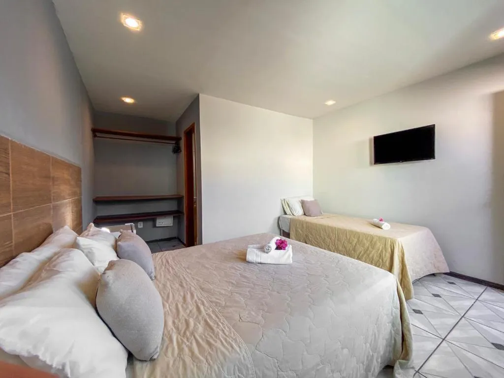 Photo of the whole room, Bed in Pousada Brisas de Búzios