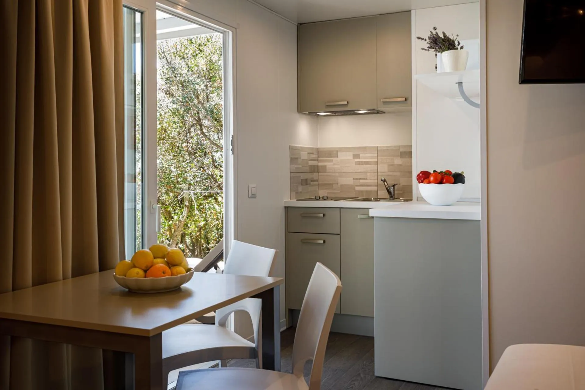 Kitchen or kitchenette in Maistra Camping Koversada Uncovered Naturist Mobile homes