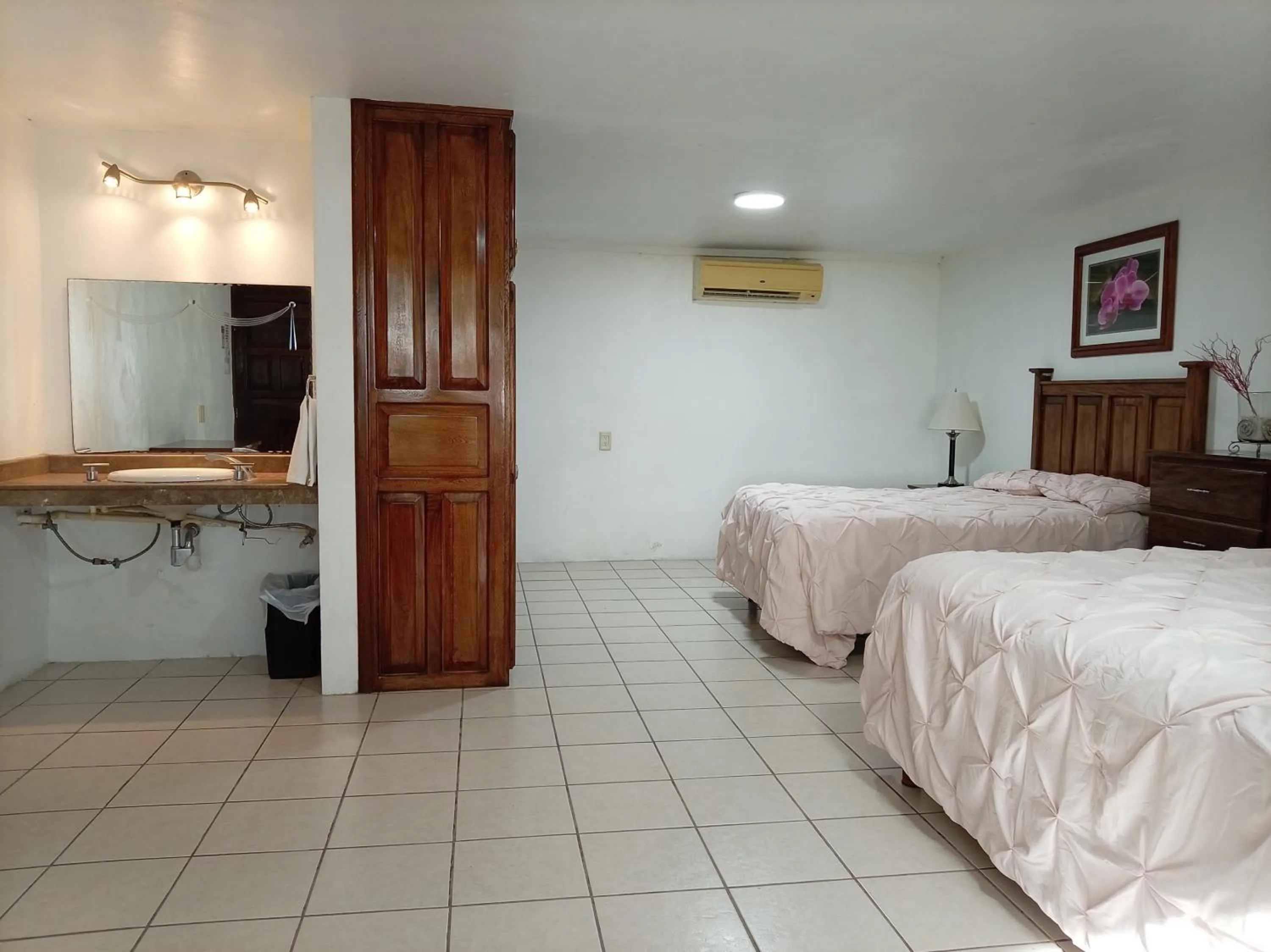 Bed in Freedom Shores "La Gringa" Hotel - Universally Designed