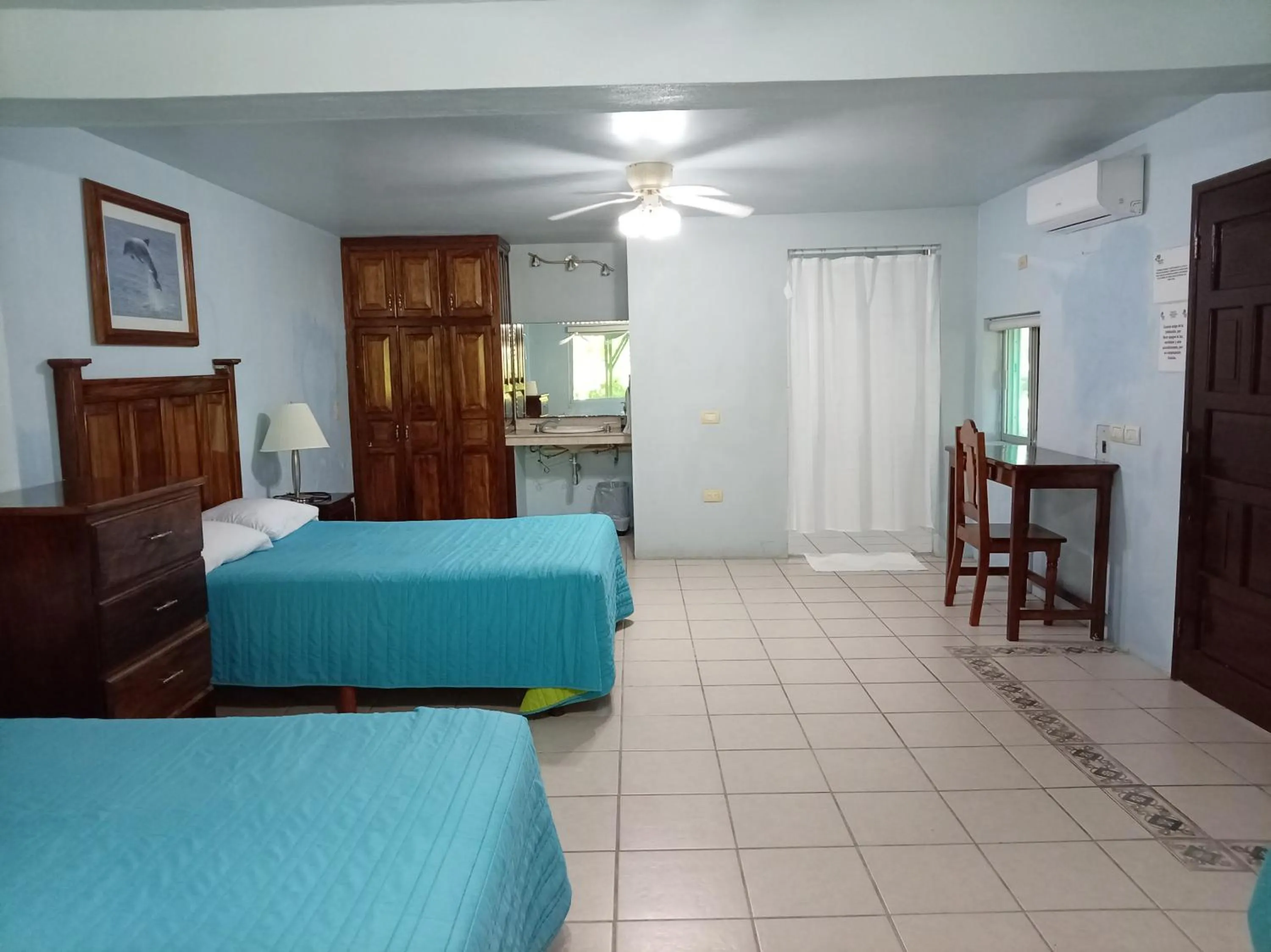 Bed in Freedom Shores "La Gringa" Hotel - Universally Designed