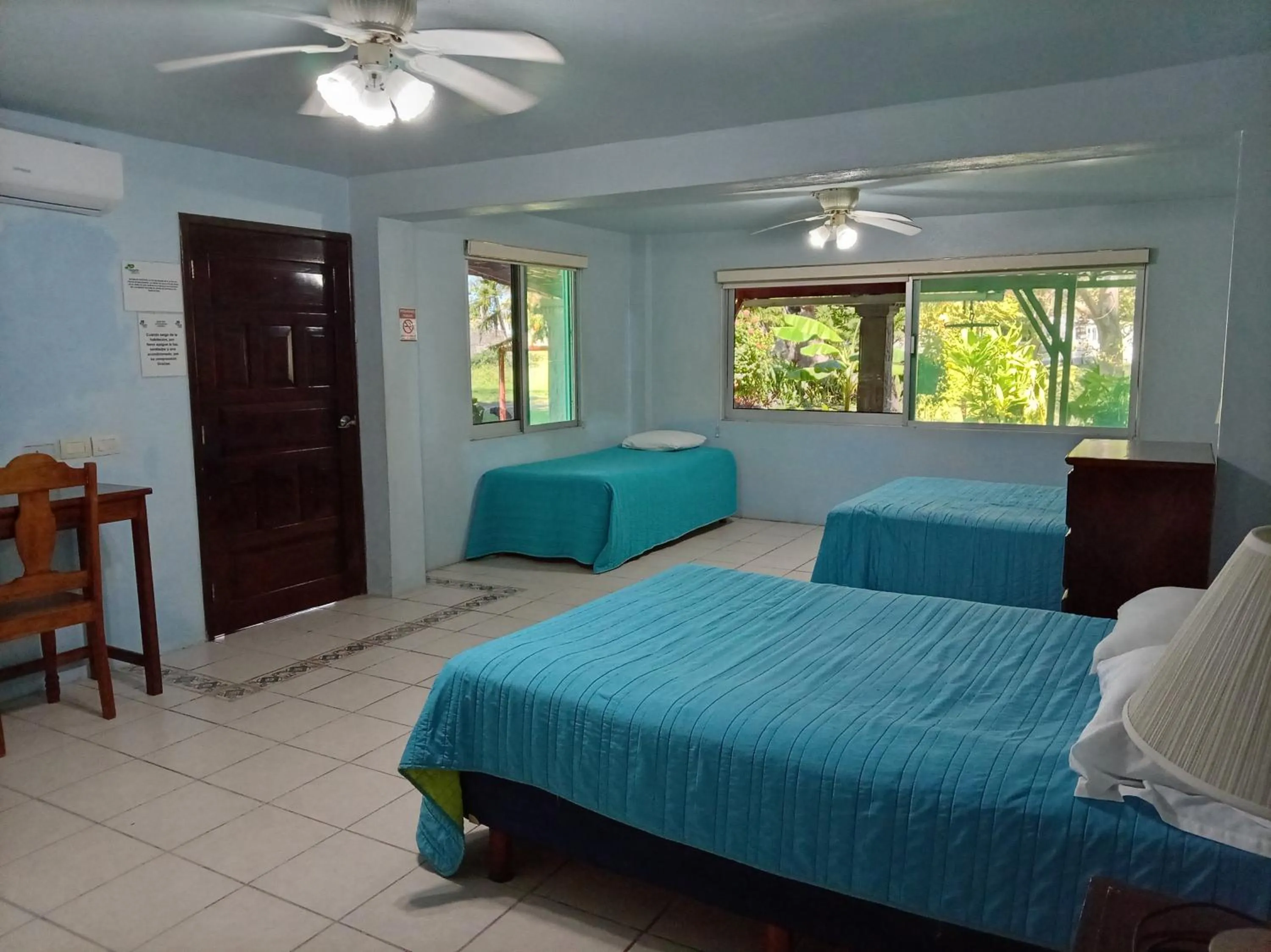 Bed in Freedom Shores "La Gringa" Hotel - Universally Designed